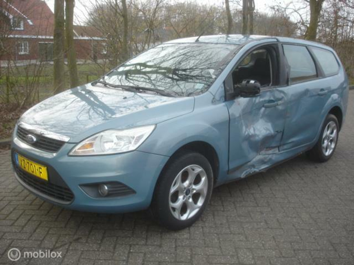 Ford Focus Wagon 1.6 Titanium Airco cruise. Zware zijschade 2008 - voorkant