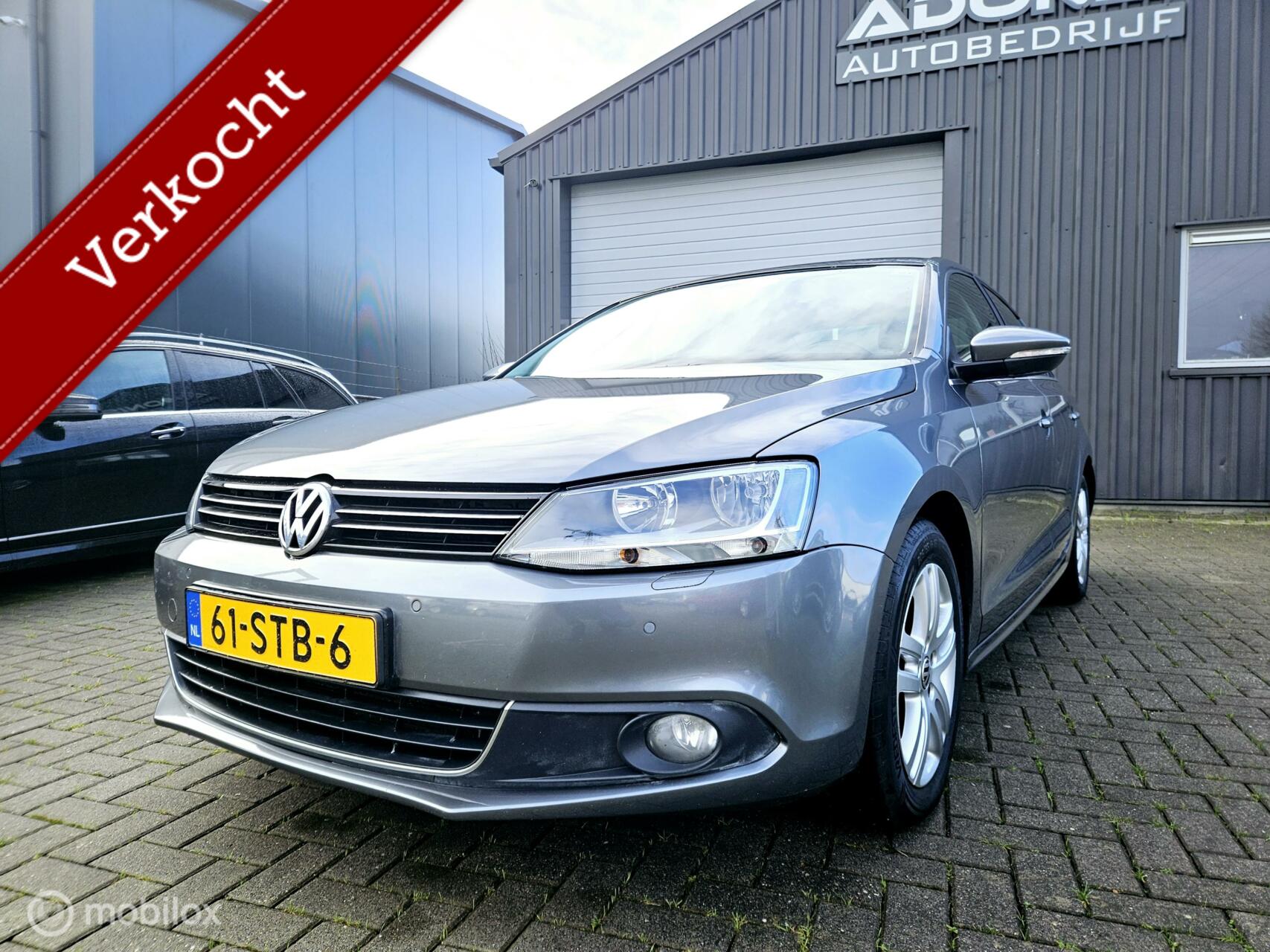 Volkswagen Jetta 1.6 TDI Highline BlueMotion APK 01/2026 VASTEPRIJS 2011 - voorkant