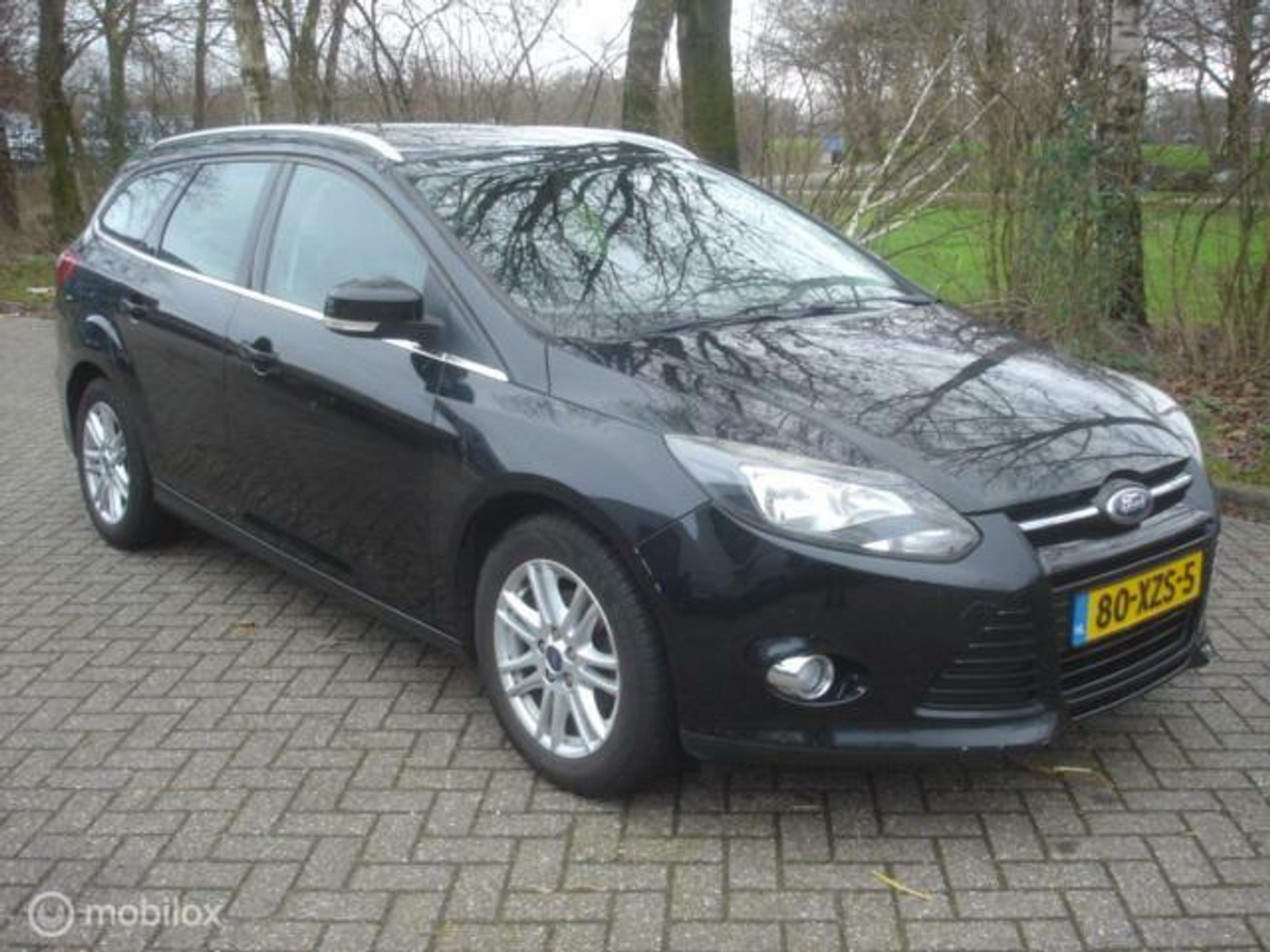 Ford Focus Wagon 1.0 EcoBoost Lease Titanium 2012 - voorkant