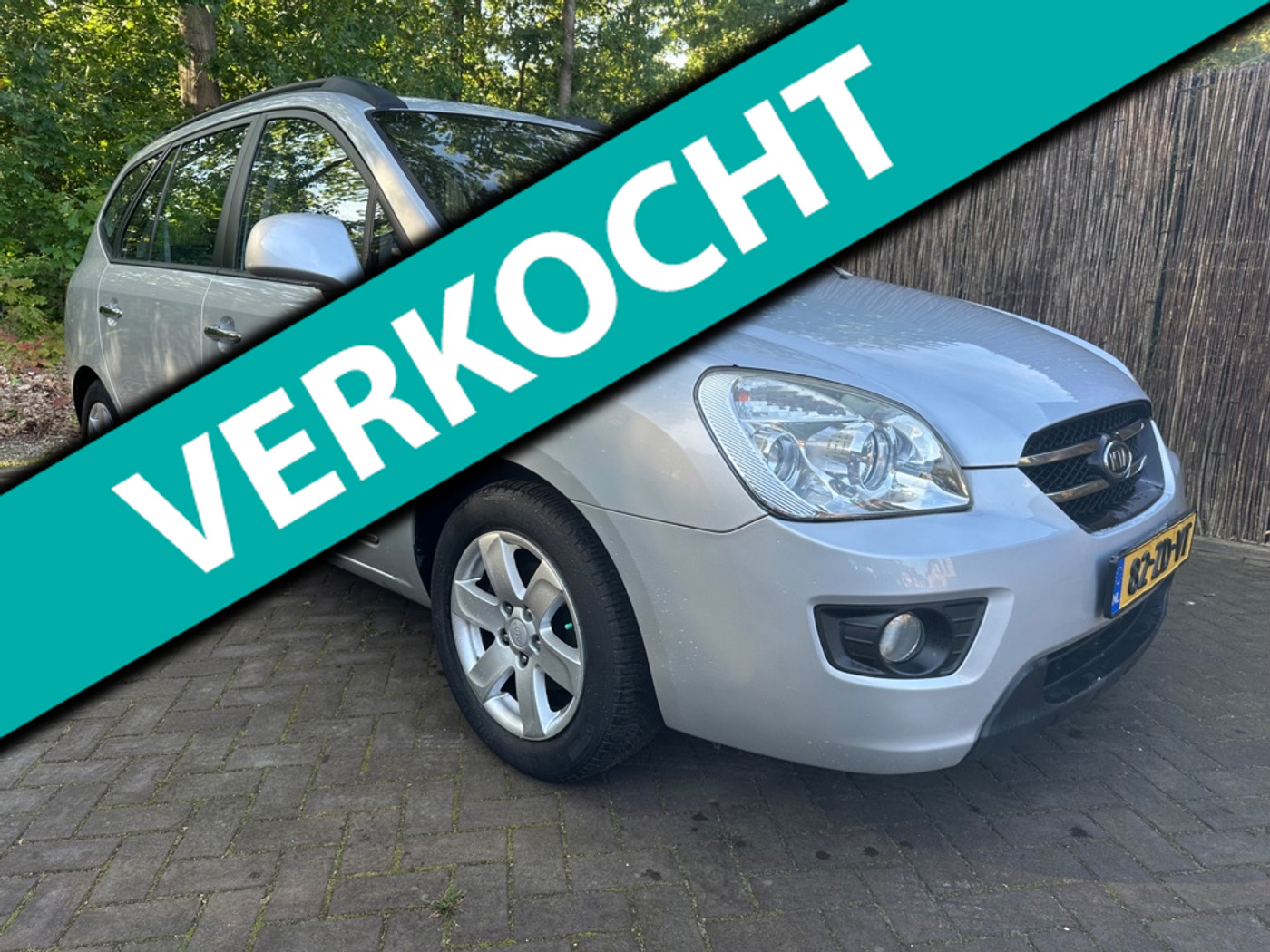 Kia Carens 2.0 CVVT X-ecutive Climate/Cruise/Dealerondh 2008 - voorkant