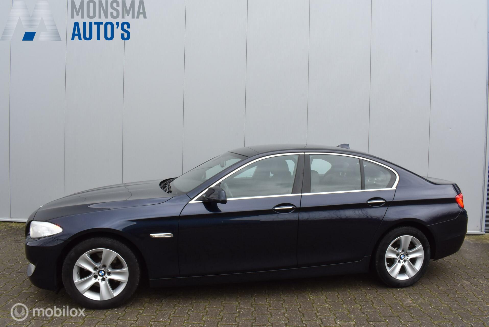 BMW 5-serie 520i High Executive 2013 - voorkant