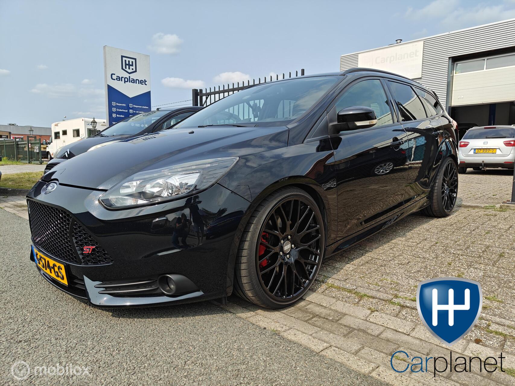 Ford Focus Wagon 2.0 EcoBoost ST-3 2e eigenaar 280pk 2013 - voorkant