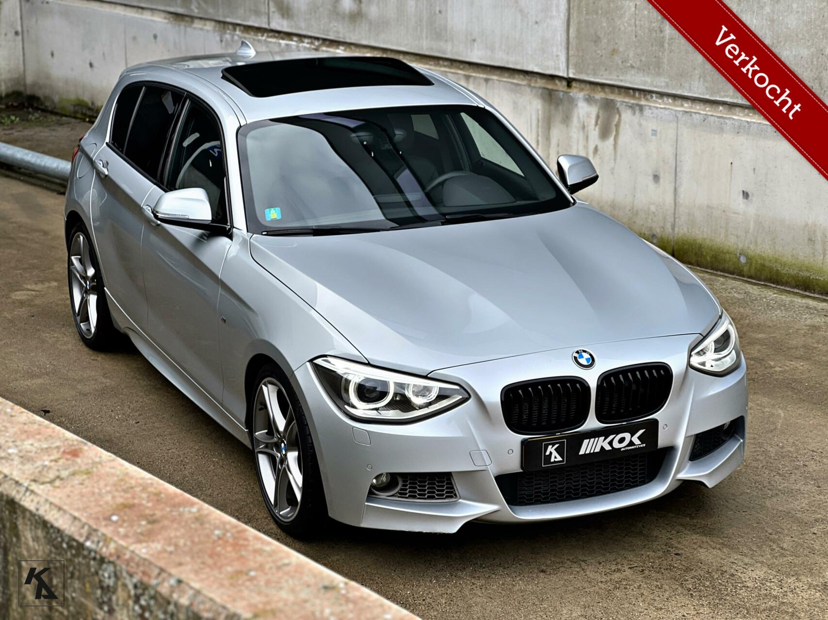 BMW 1-serie 118i High Executive Upgrade 2013 - voorkant