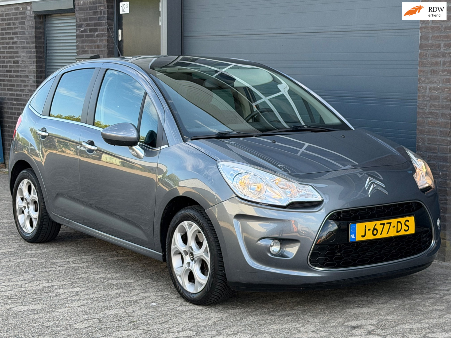 Citroen C3 1.6 VTi Exclusive AIRCO CRUISE NAVI TREKHAAK PDC 2010 - voorkant