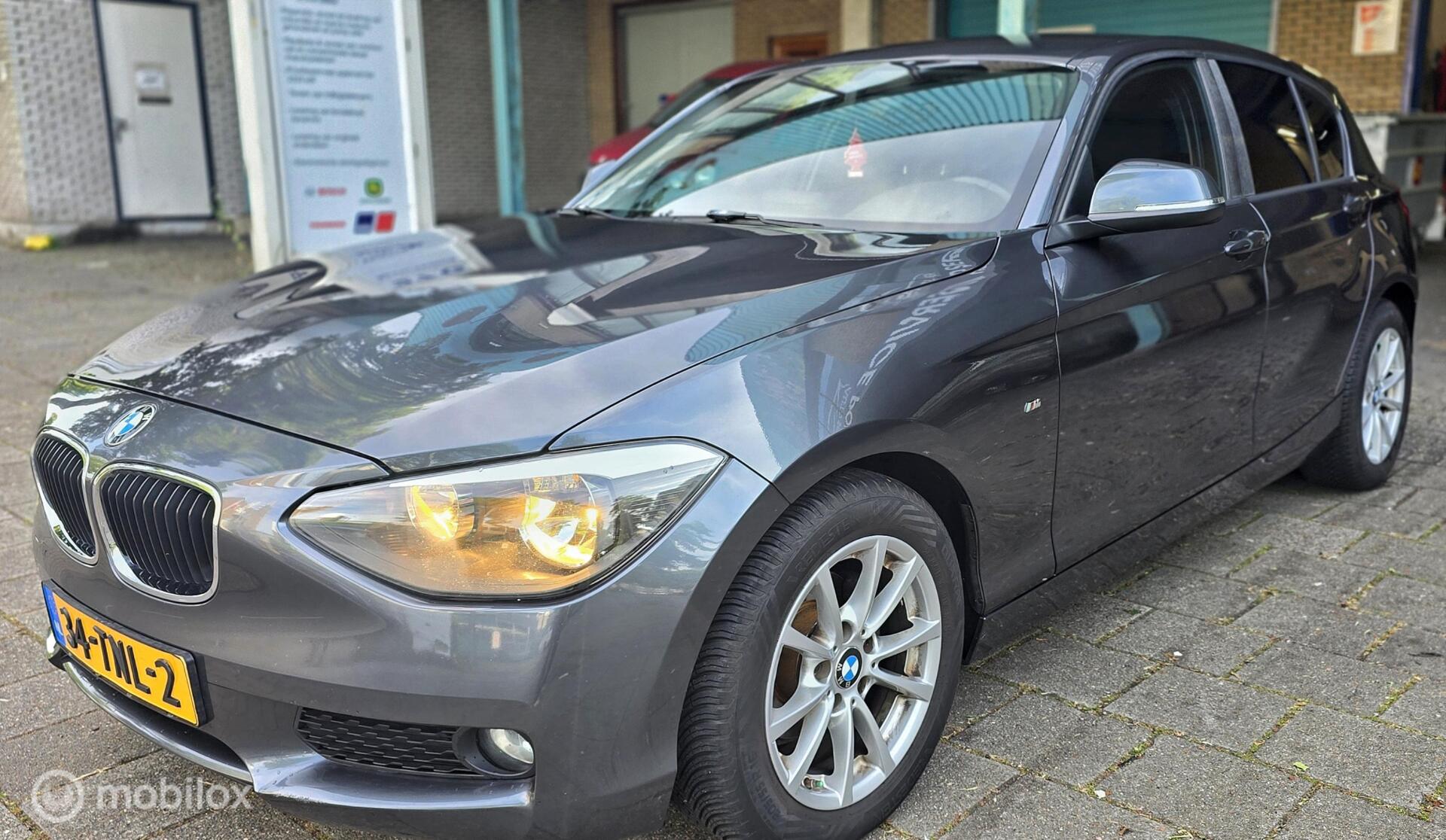 BMW 1er Reihe 116i Business+ Automaat 2012 - voorkant