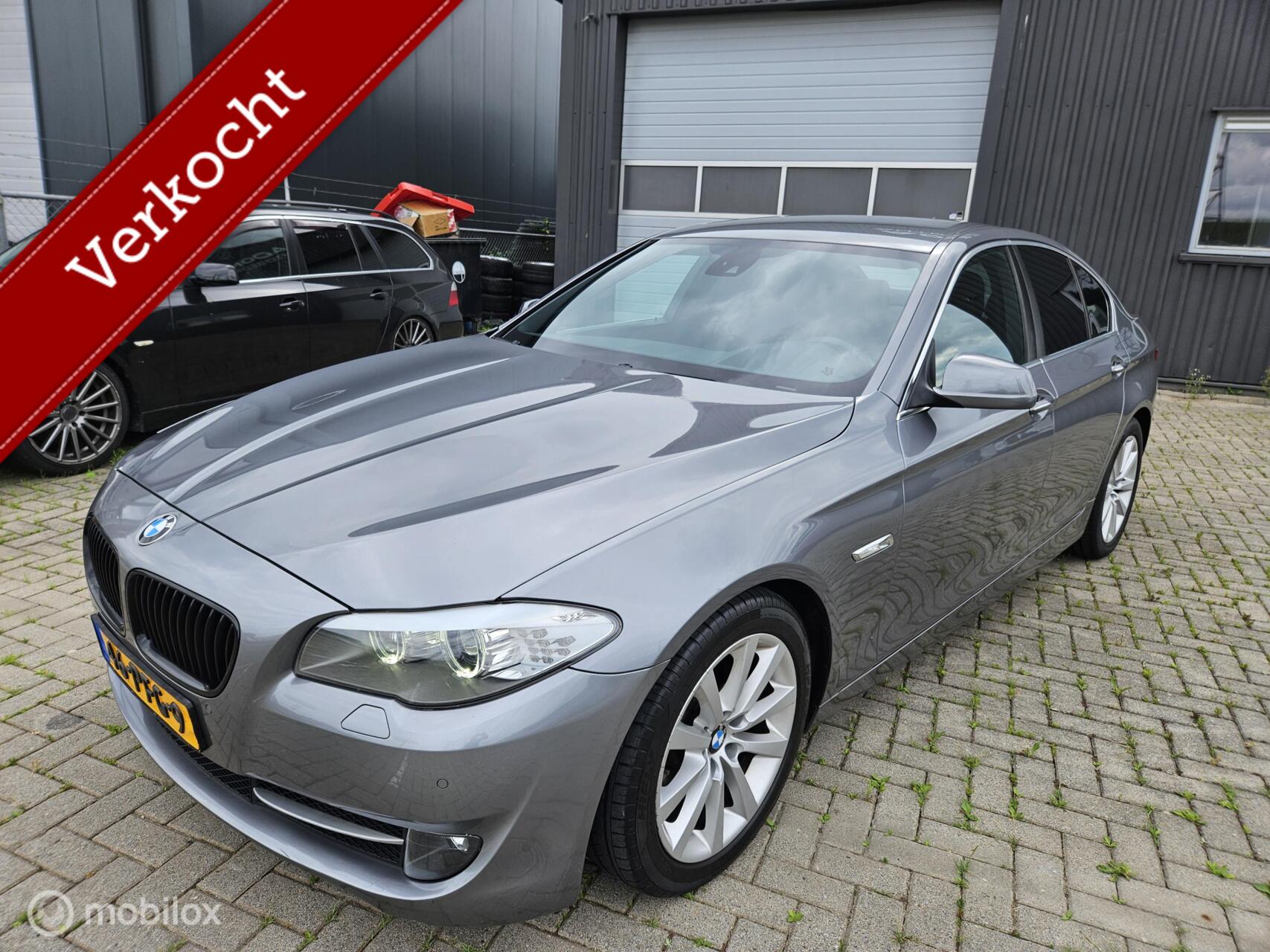 BMW 523i 523i High Executive AIRCO/CRUISE/LEER/NAVI APK05/2027 VASTEPRIJS 2011 - voorkant