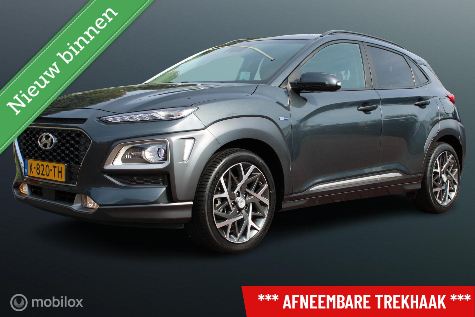 Hyundai Kona 1.6 GDI HEV Premium, Stoel-stuurverwarming + koeling, Trekhaak, Donker glas, Navi, App connect, Cruise, Clima, head-up display, Pdc + camera 2021 - voorkant