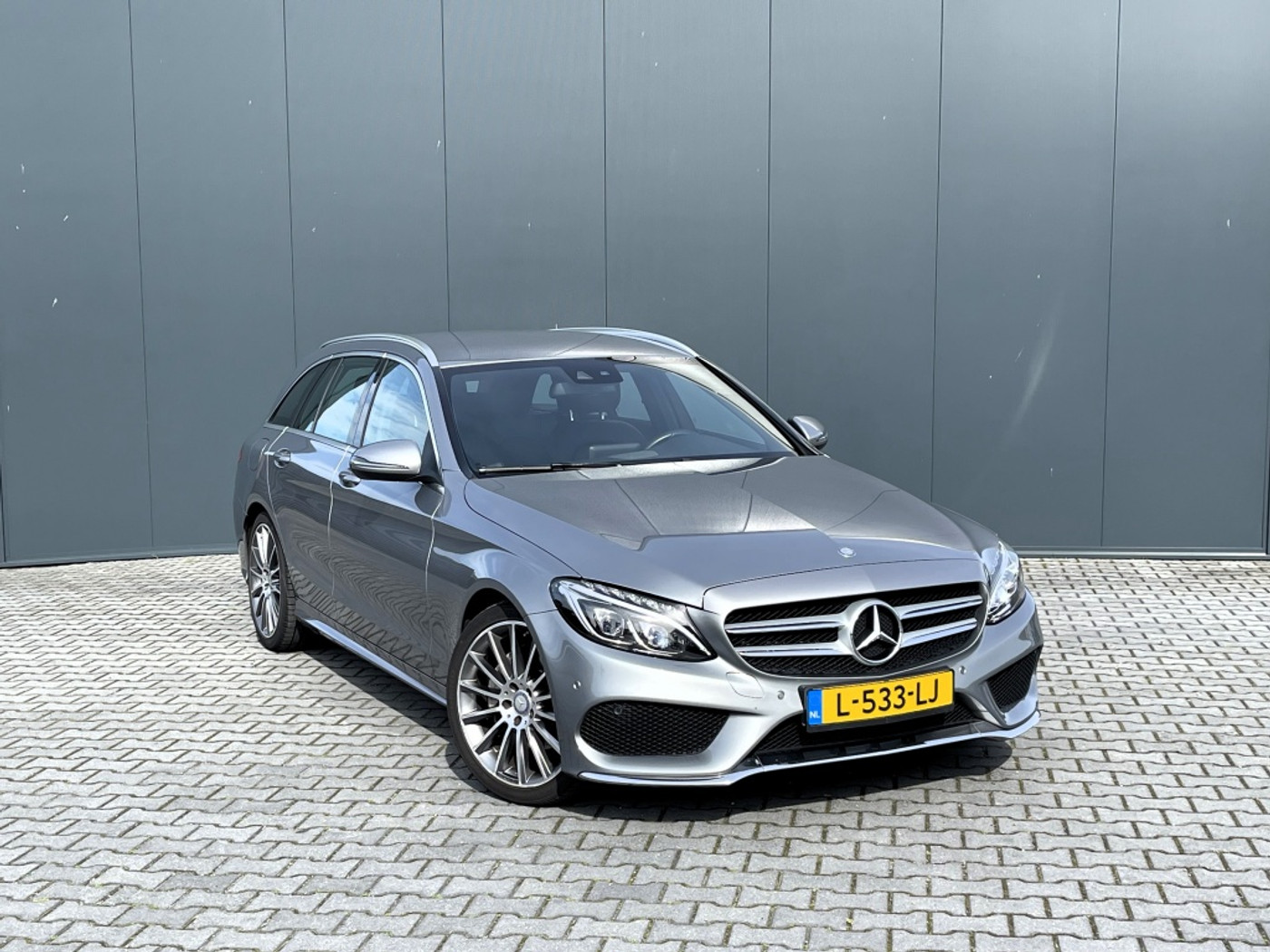 Mercedes-Benz C 200 T-Model F! flippers 7G AUT 2015 - voorkant