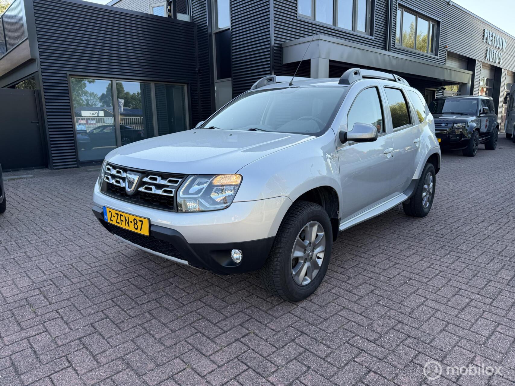 Dacia Duster 1.2 TCe 4x2 Prestige Airco Navigatie Trekh Nap 2015 - voorkant