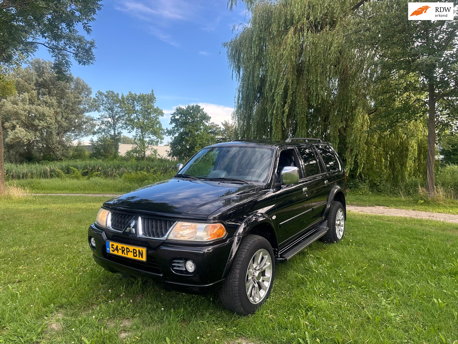 Mitsubishi Pajero Sport 3.0 V6 Intense Airco Cruise 4X4 DAKAR EDITION 2005 - voorkant