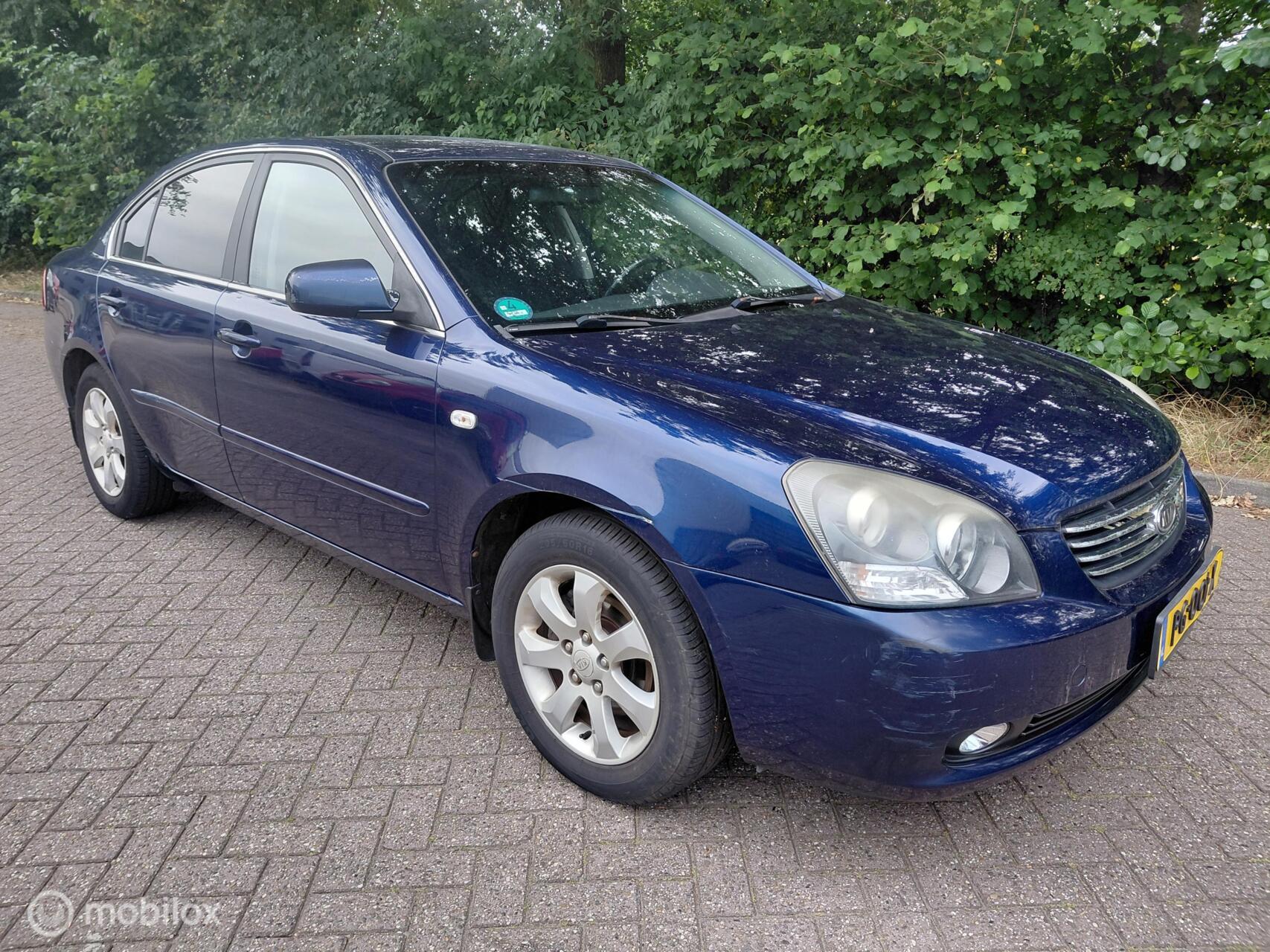 Kia Magentis 2.0 CRDi EX 6 bak - airco - cruise. APK 8-2027 2006 - voorkant
