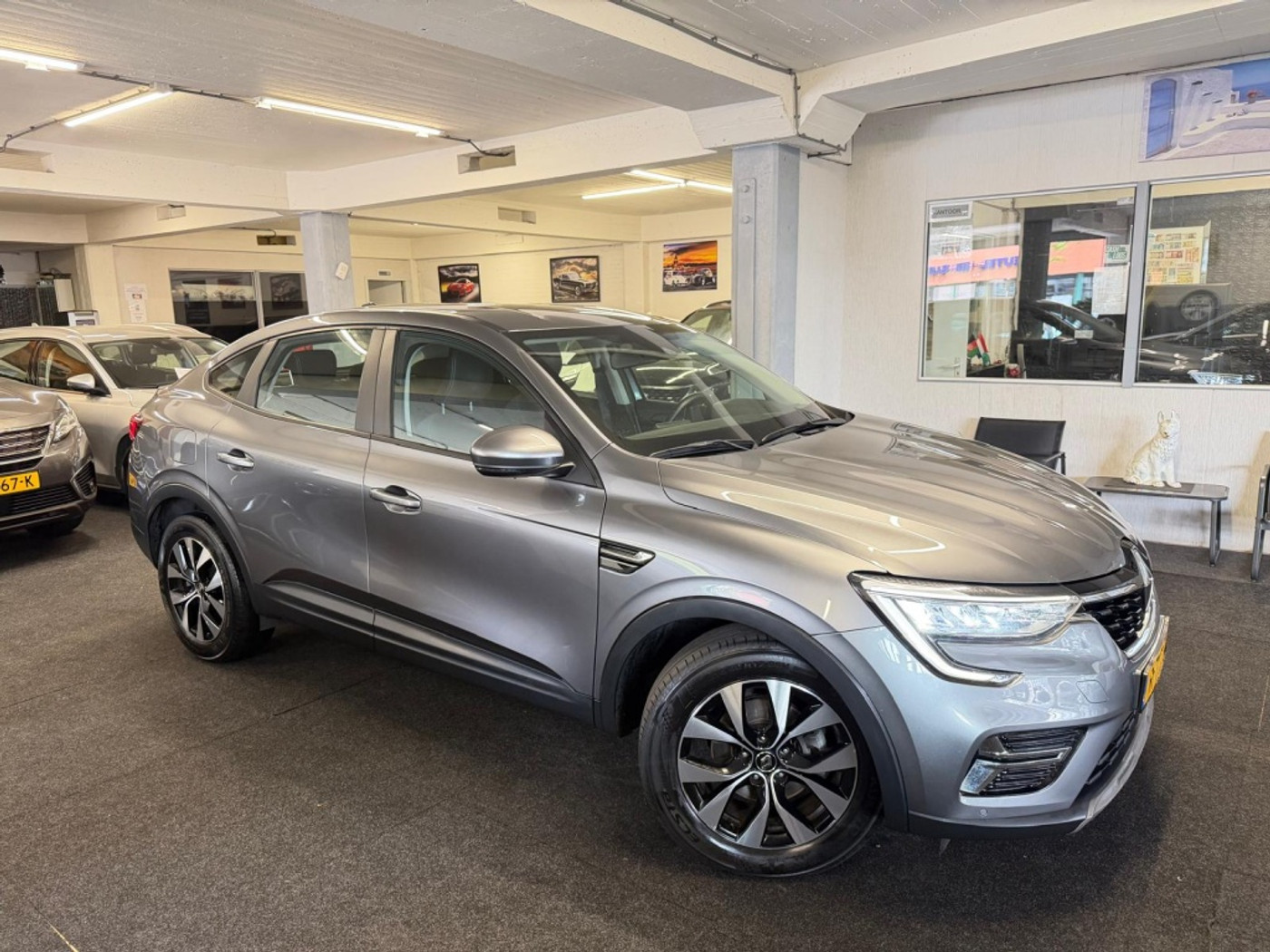 Renault Arkana E-tech 1.6 E-T H 145 Zen*NAP*Camera*Velgen 2022 - voorkant