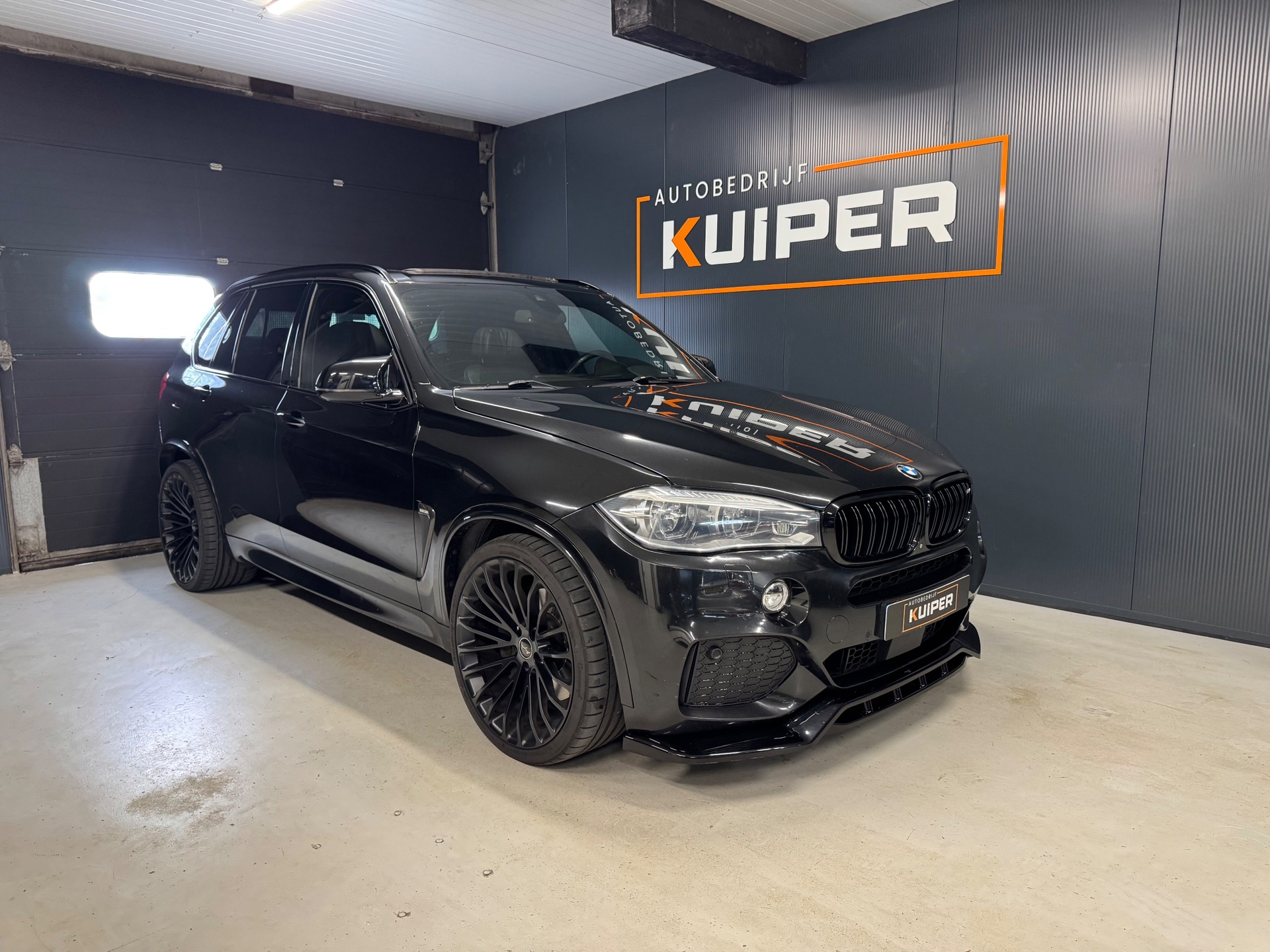 Foto van BMW X5 M50d