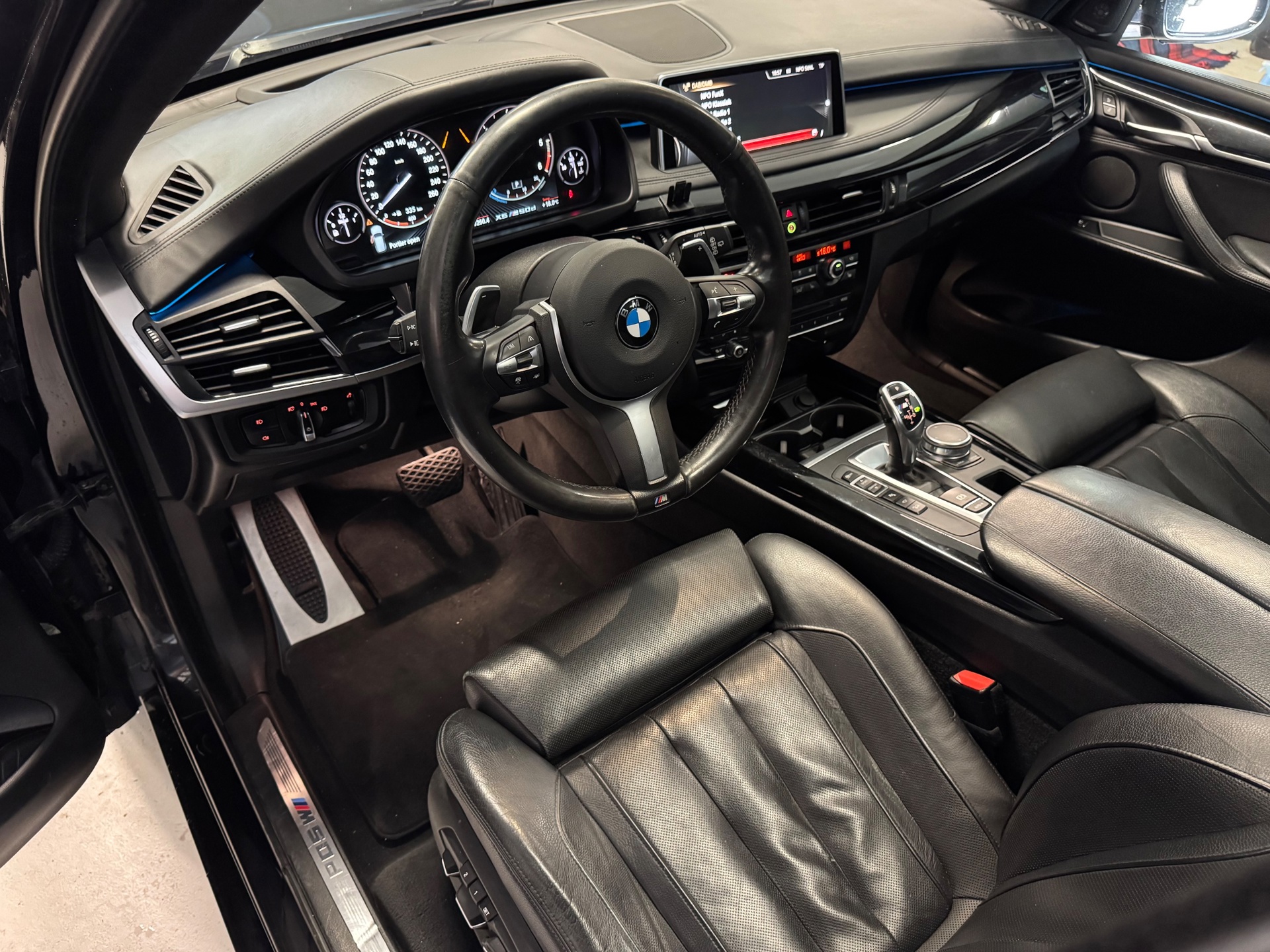 Foto van BMW X5 M50d