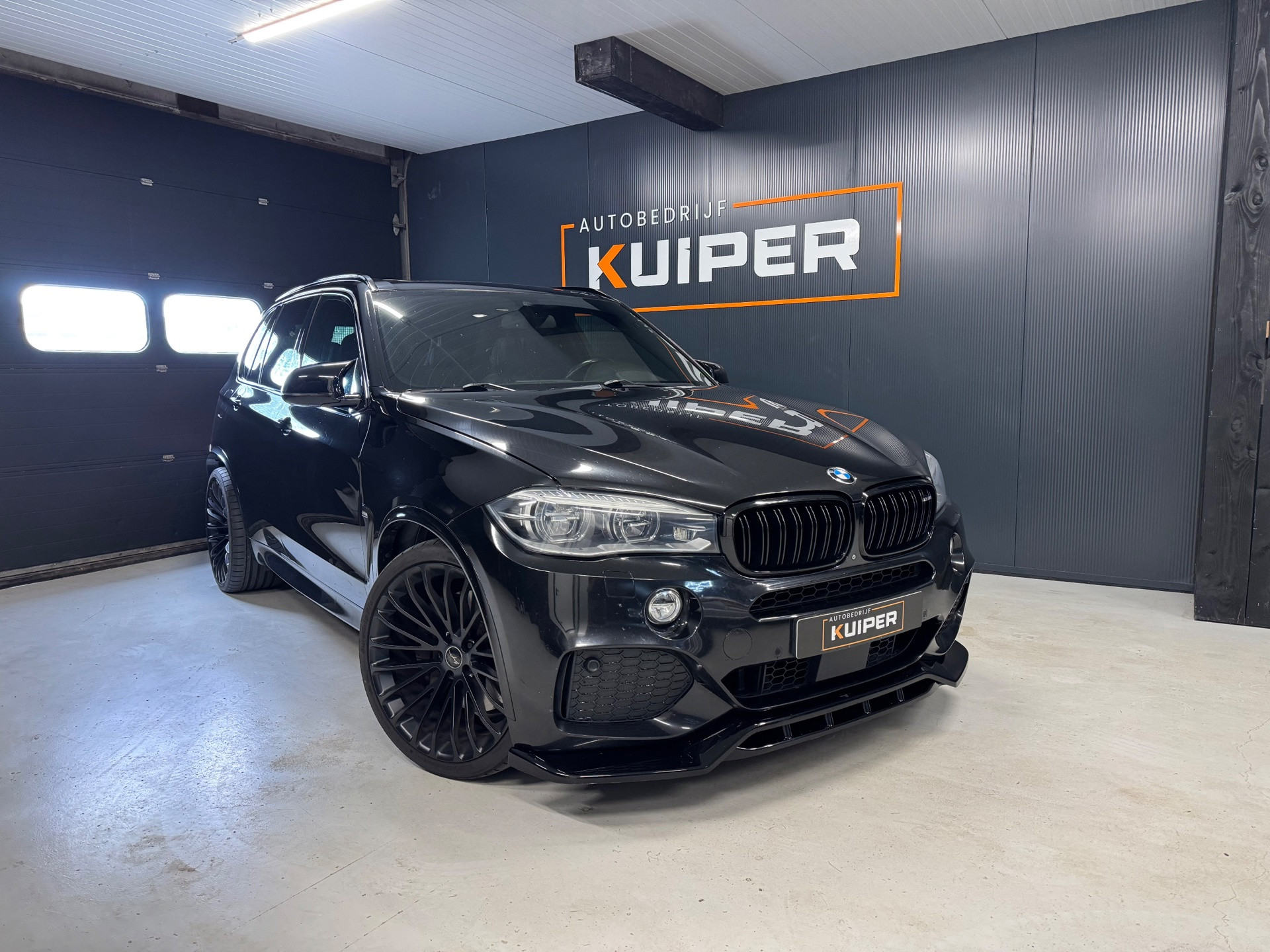 Foto van BMW X5 M50d