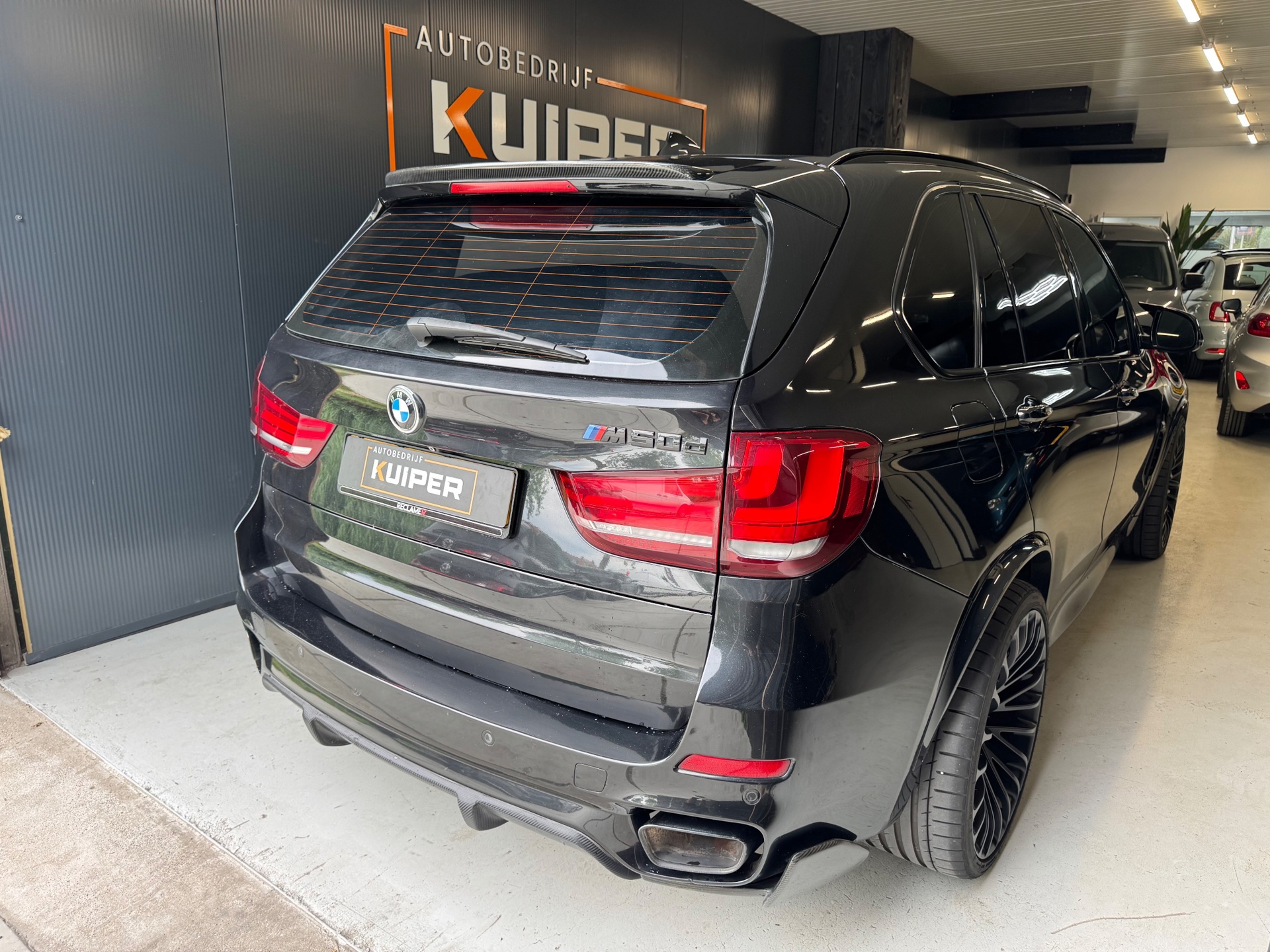 Foto van BMW X5 M50d