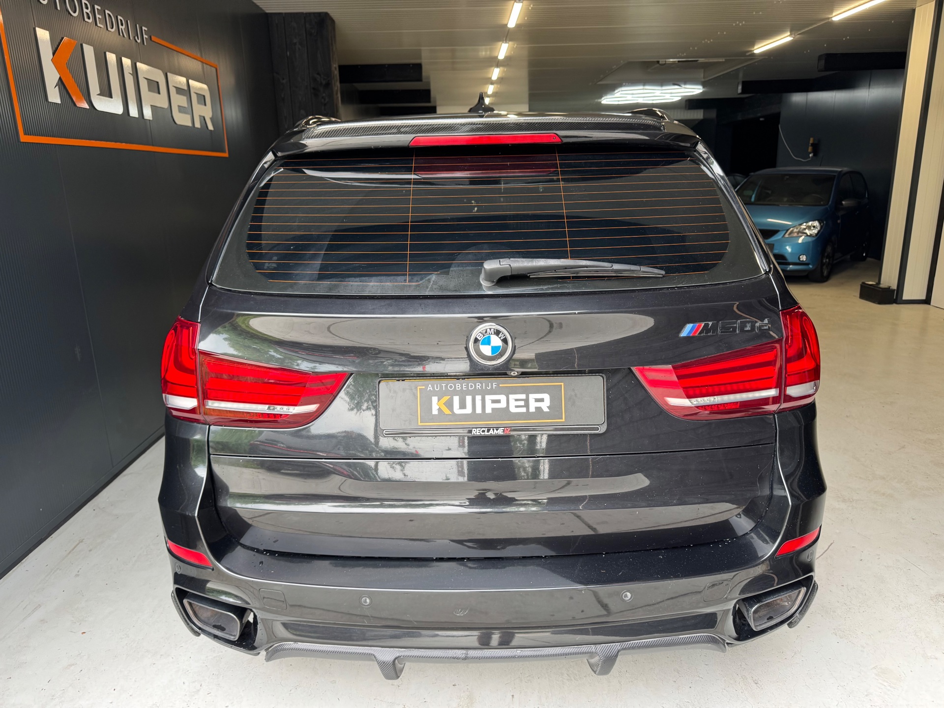 Foto van BMW X5 M50d