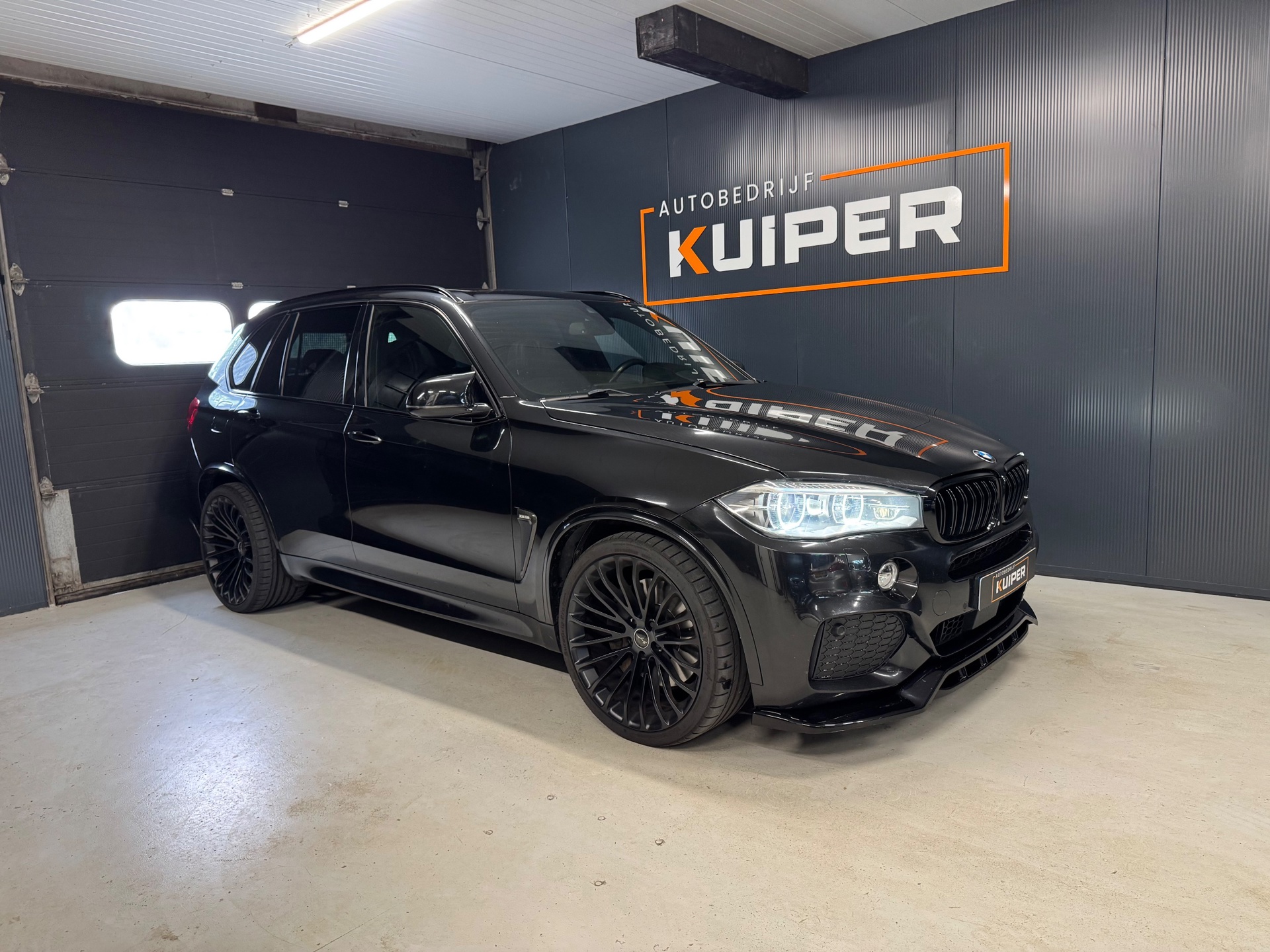 Foto van BMW X5 M50d