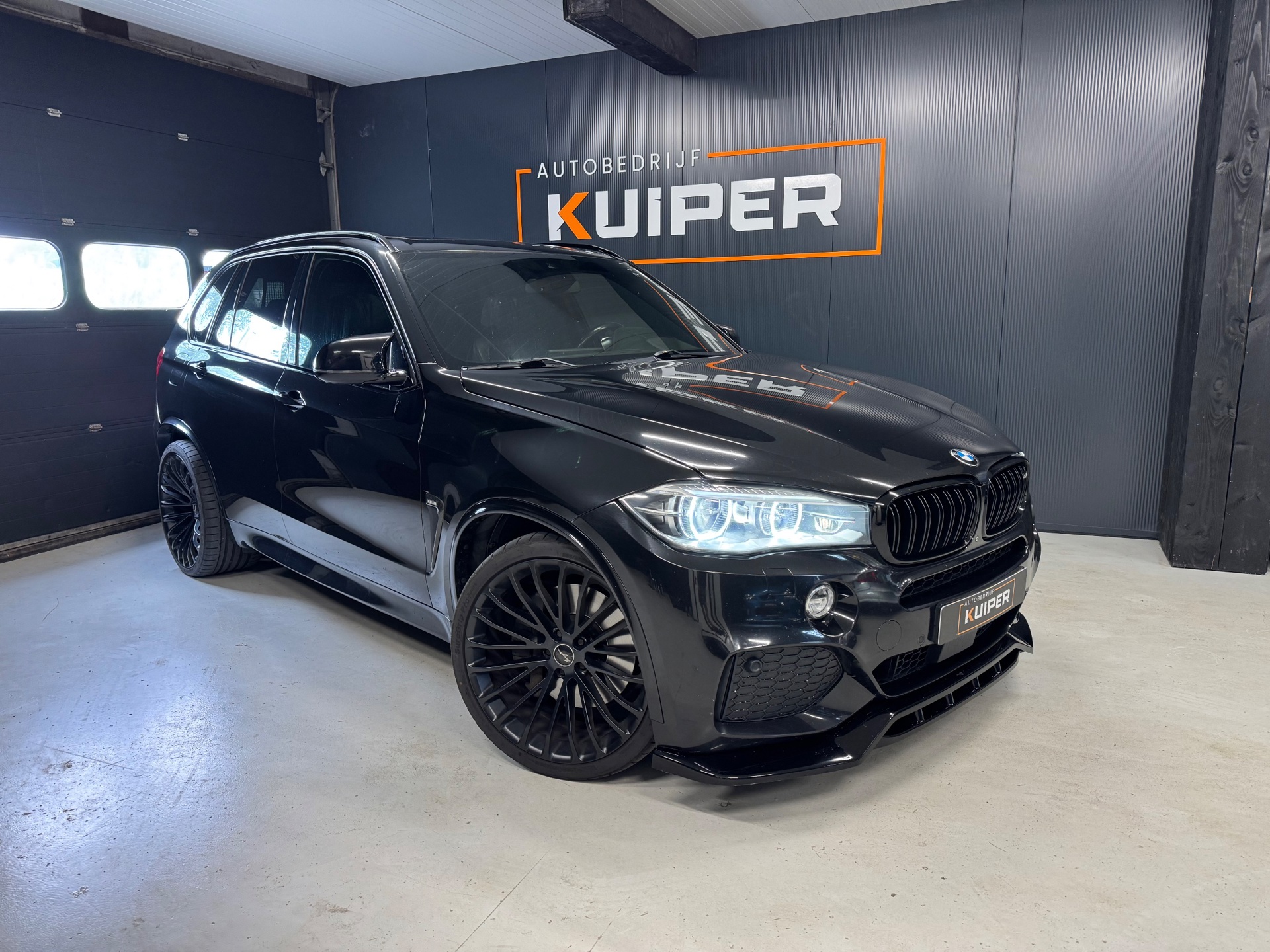 Foto van BMW X5 M50d