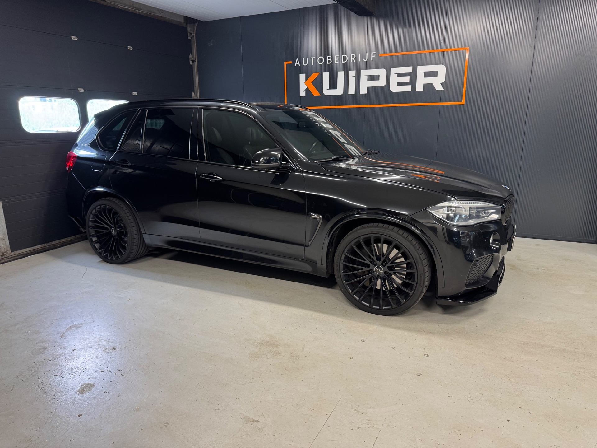 Foto van BMW X5 M50d