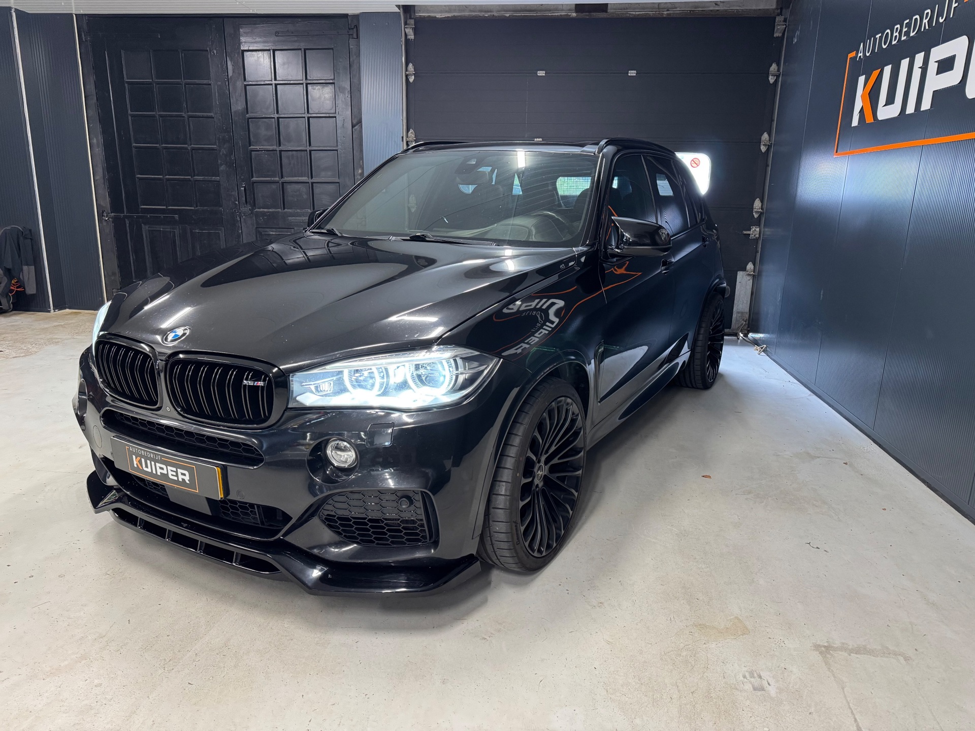 Foto van BMW X5 M50d