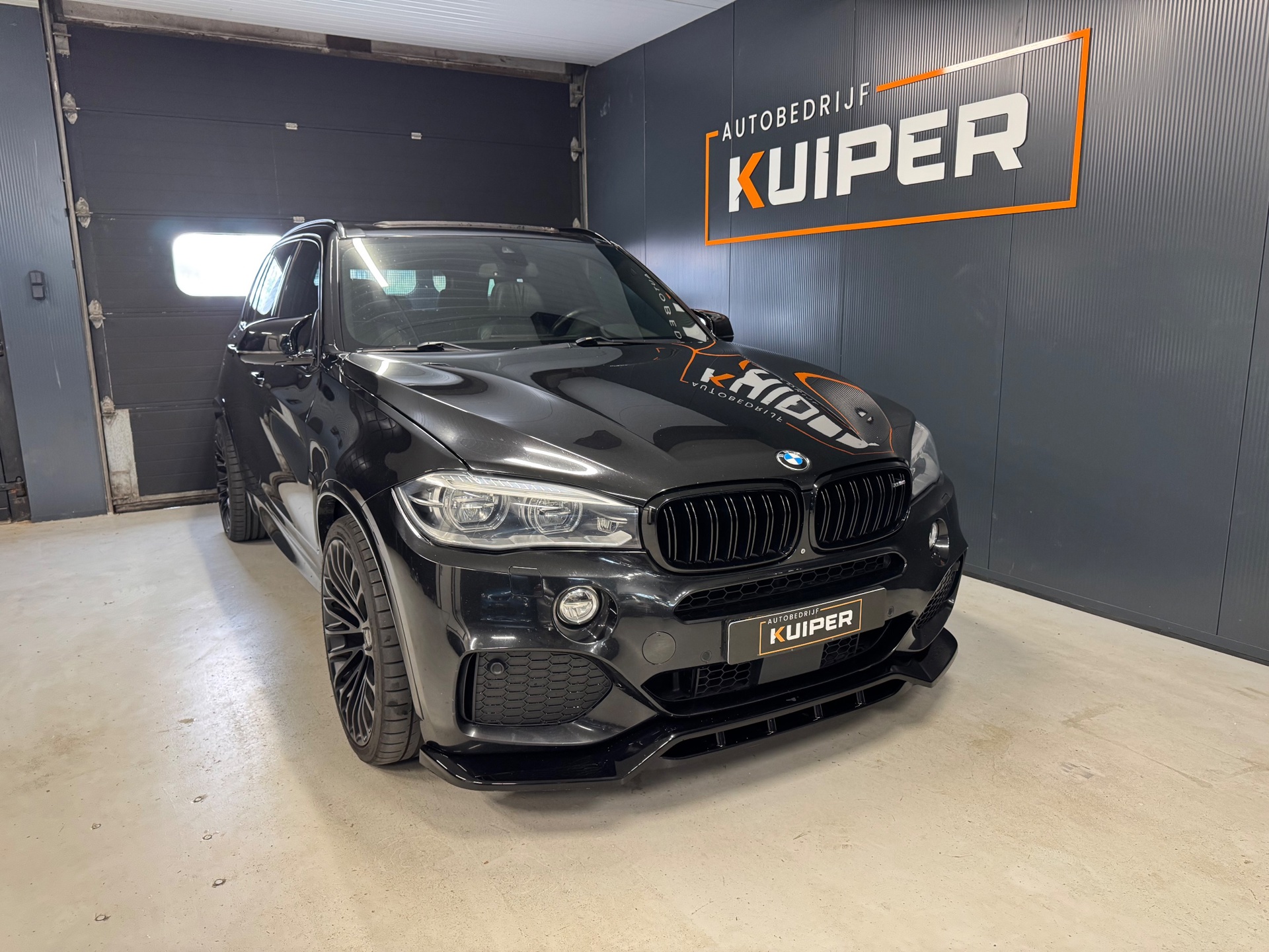 Foto van BMW X5 M50d