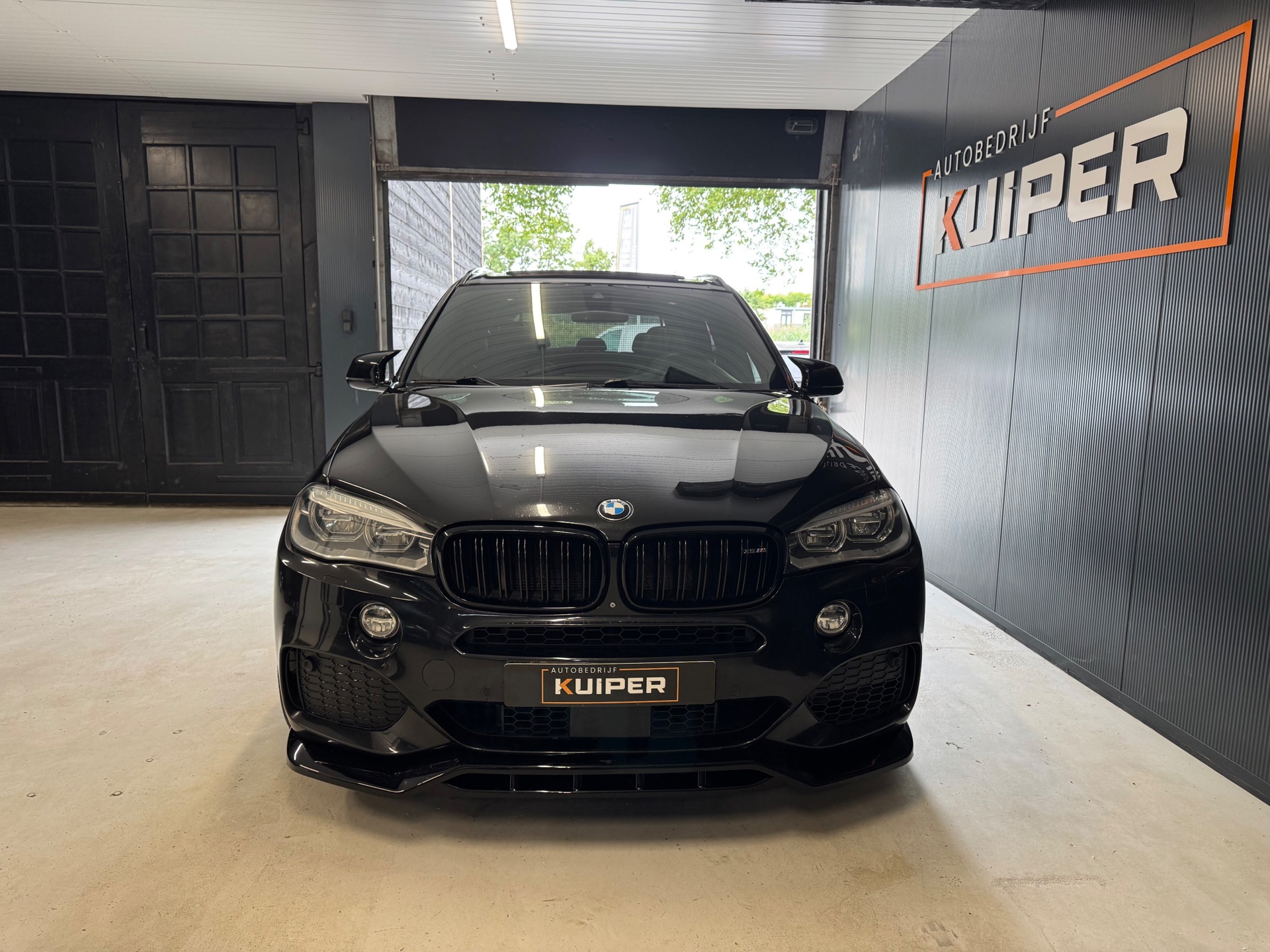 Foto van BMW X5 M50d