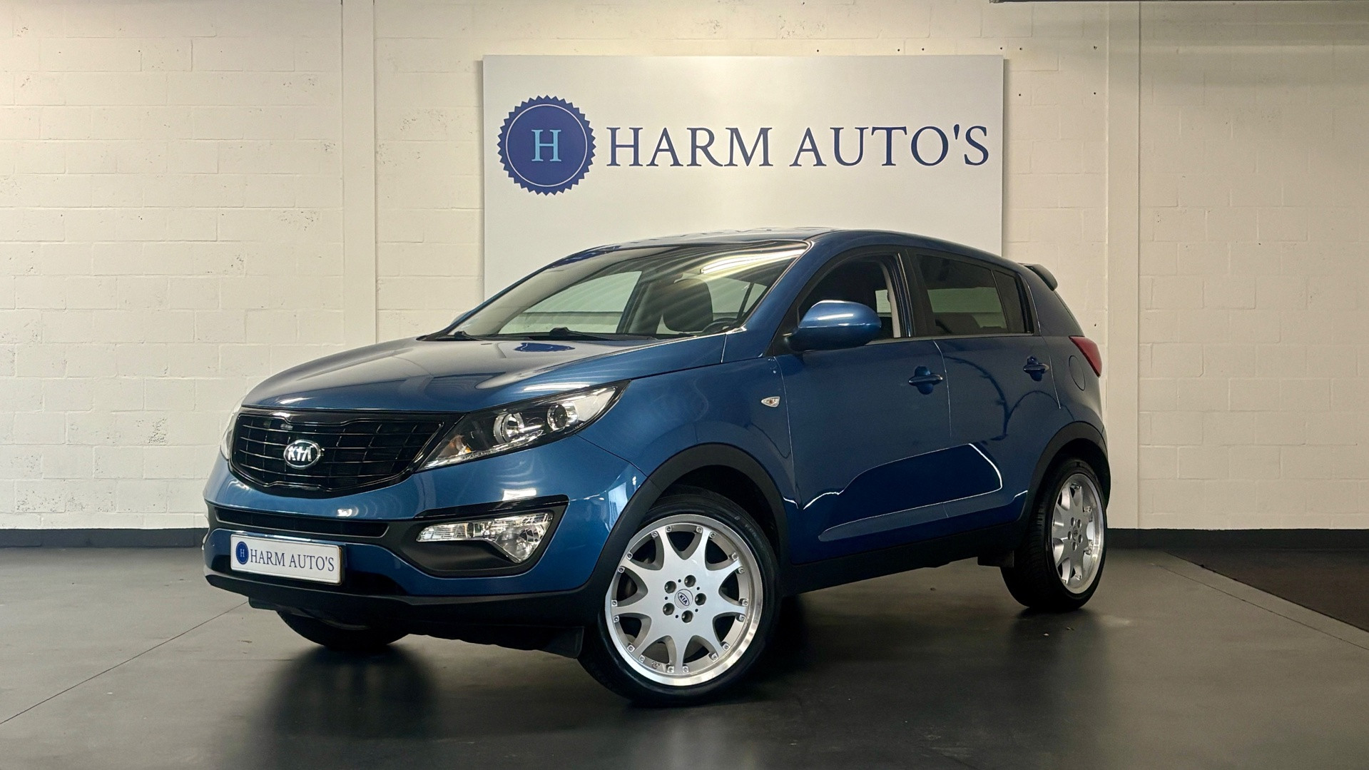 Kia Sportage 1.6 GDI EconomyLine Navi / Trekhaak / CAM / Cruise 2014 - voorkant