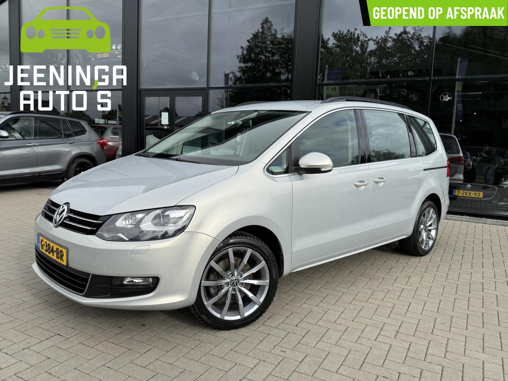 Volkswagen Sharan 1.4 TSI Highline 7p. |PDC|Navi|ElektrischeTrekhaak|18" 2013 - voorkant