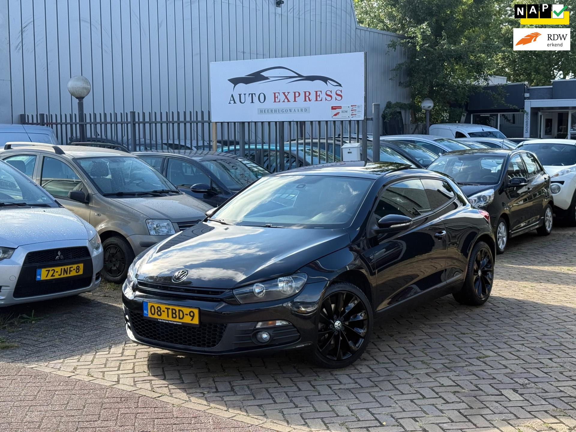 Volkswagen Scirocco 1.4 TSI Edition/Pano Dak/Cruis/Navigatie/sportieve uitlaat/Nap/Nieuw Apk/Volledig onderhoud/6Maanden Garantie 2012 - voorkant
