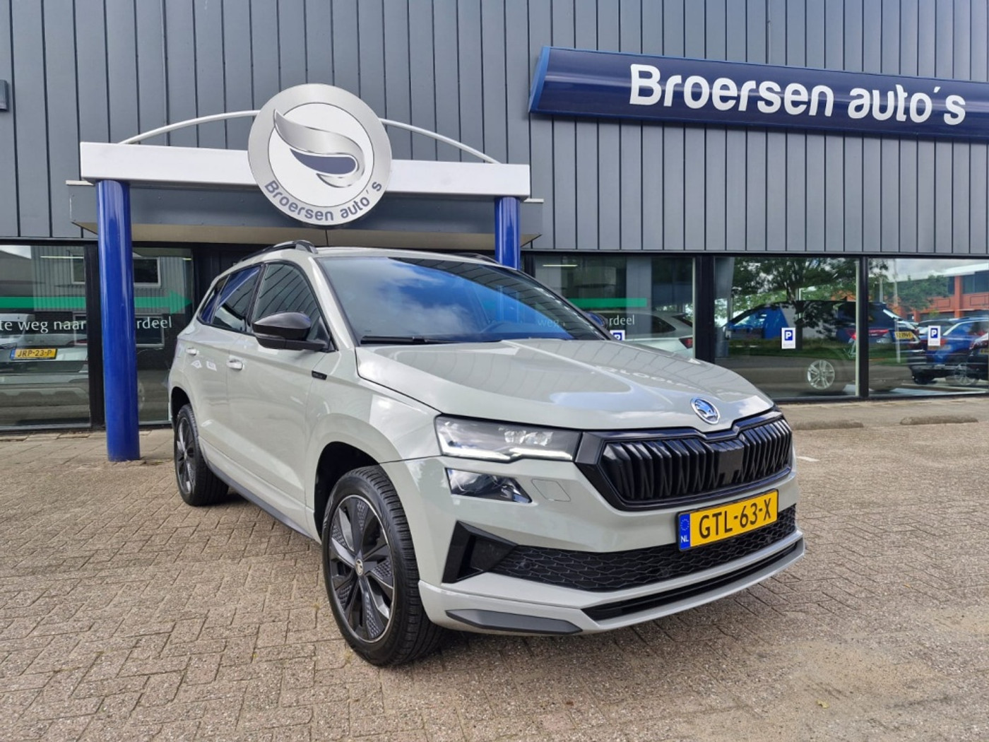 Skoda Karoq 1.5 TSI Sportline Business | Automaat | Adaptieve Cruise Control | Dodehoek | 2024 - voorkant