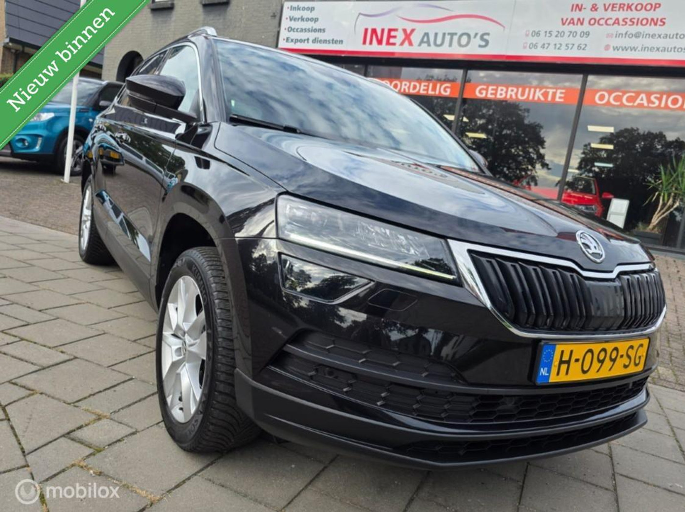 Skoda Karoq 1.5 TSI ACT Sportline Business Keyless Carplay Dealer onderhouden 2020 - voorkant