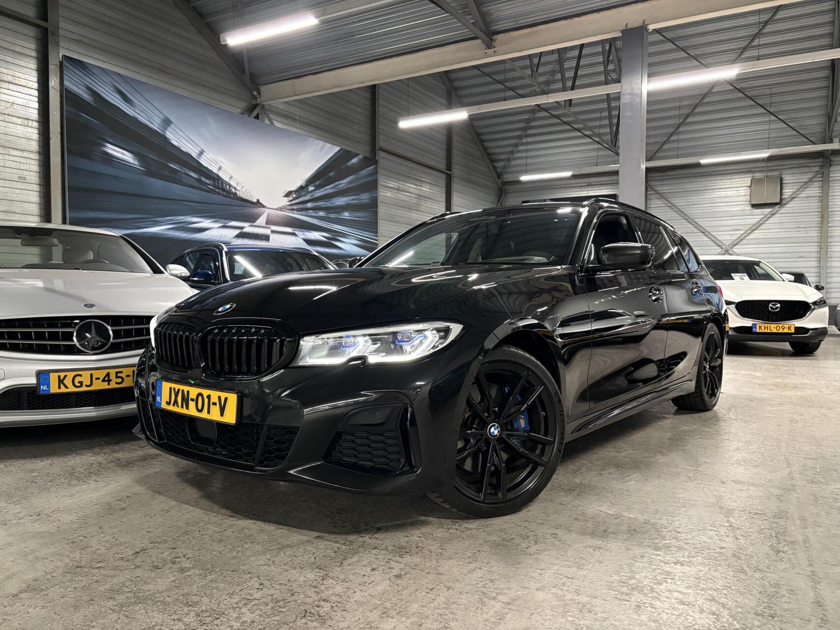 BMW 3-serie Touring M340i xD High Executive|Laser|HUD|422PK/566Nm 2021 - voorkant