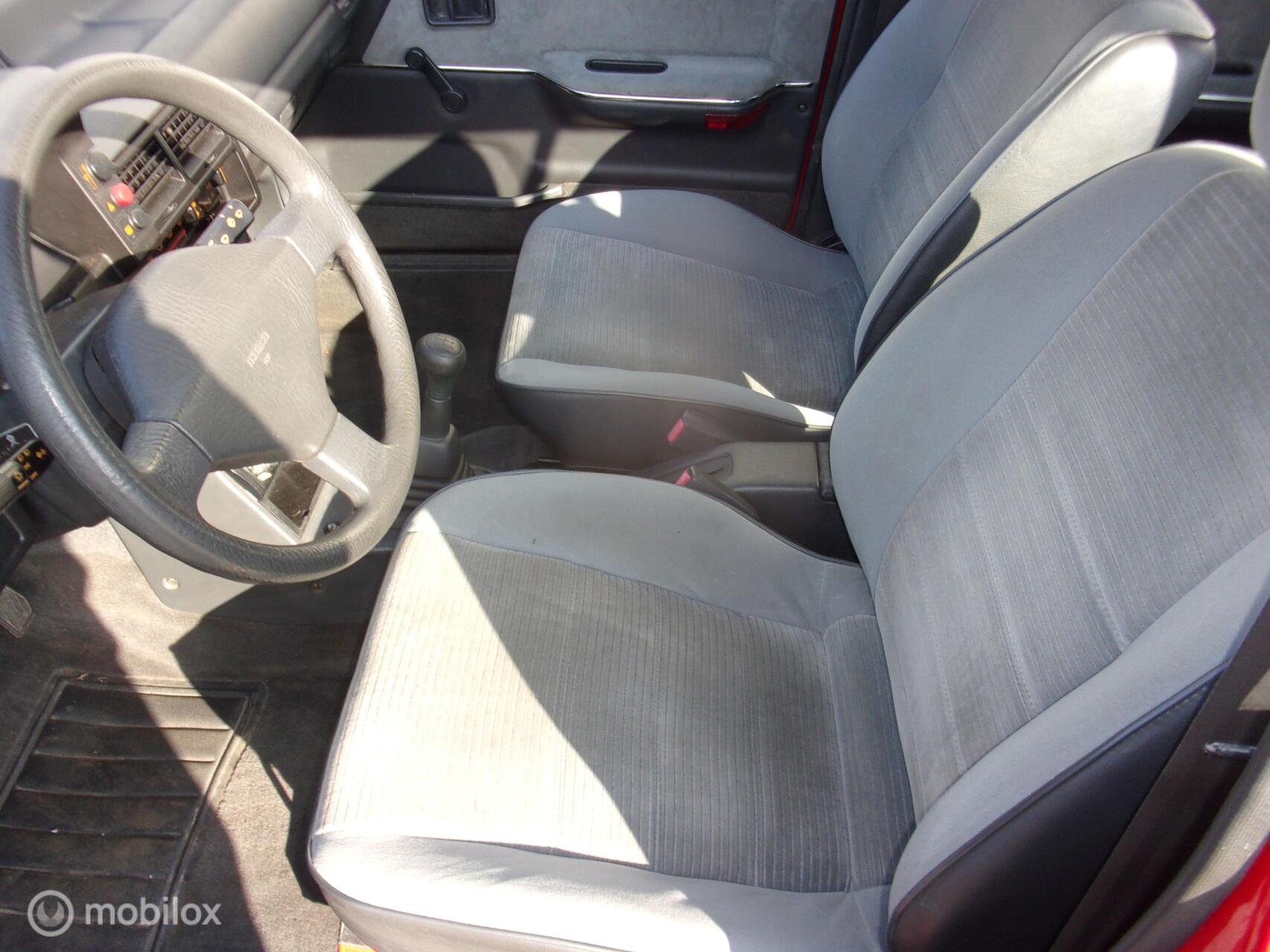 Foto van Mazda 323