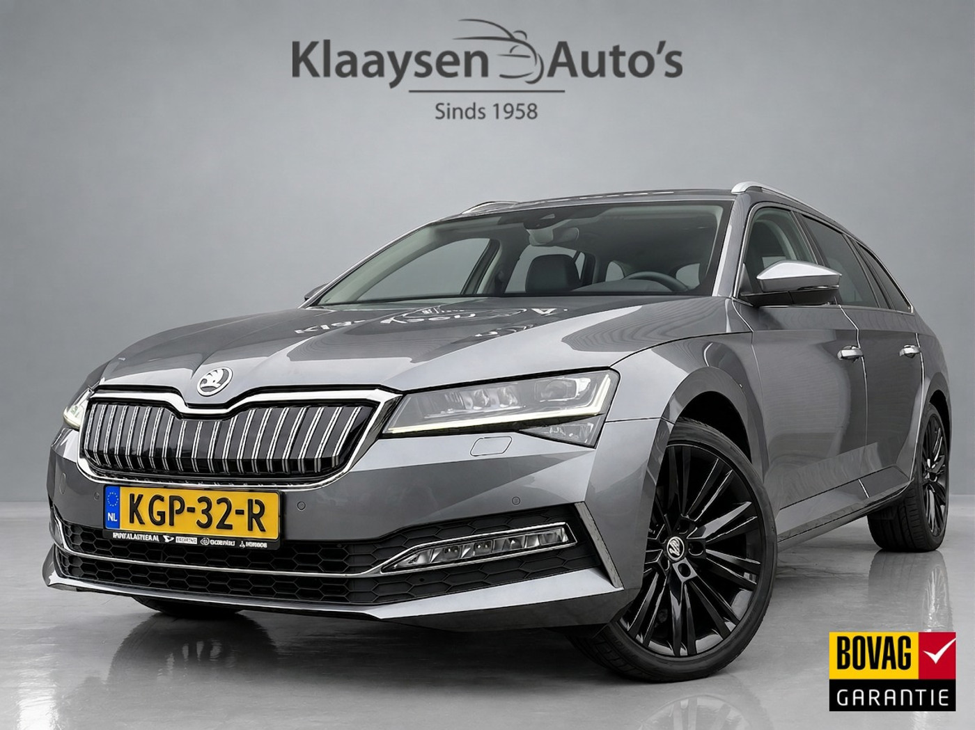 Škoda Superb Combi 1.4 TSI iV 218 pk Business Edition Plus AUT. | 1e eigenaar | navigatie | panoramadak | trekhaak | leder interieur 2022 - voorkant