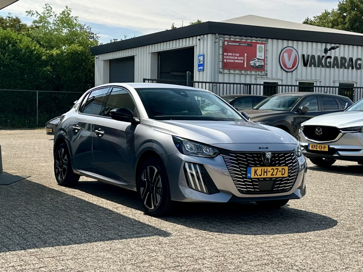 Foto van Peugeot E-208