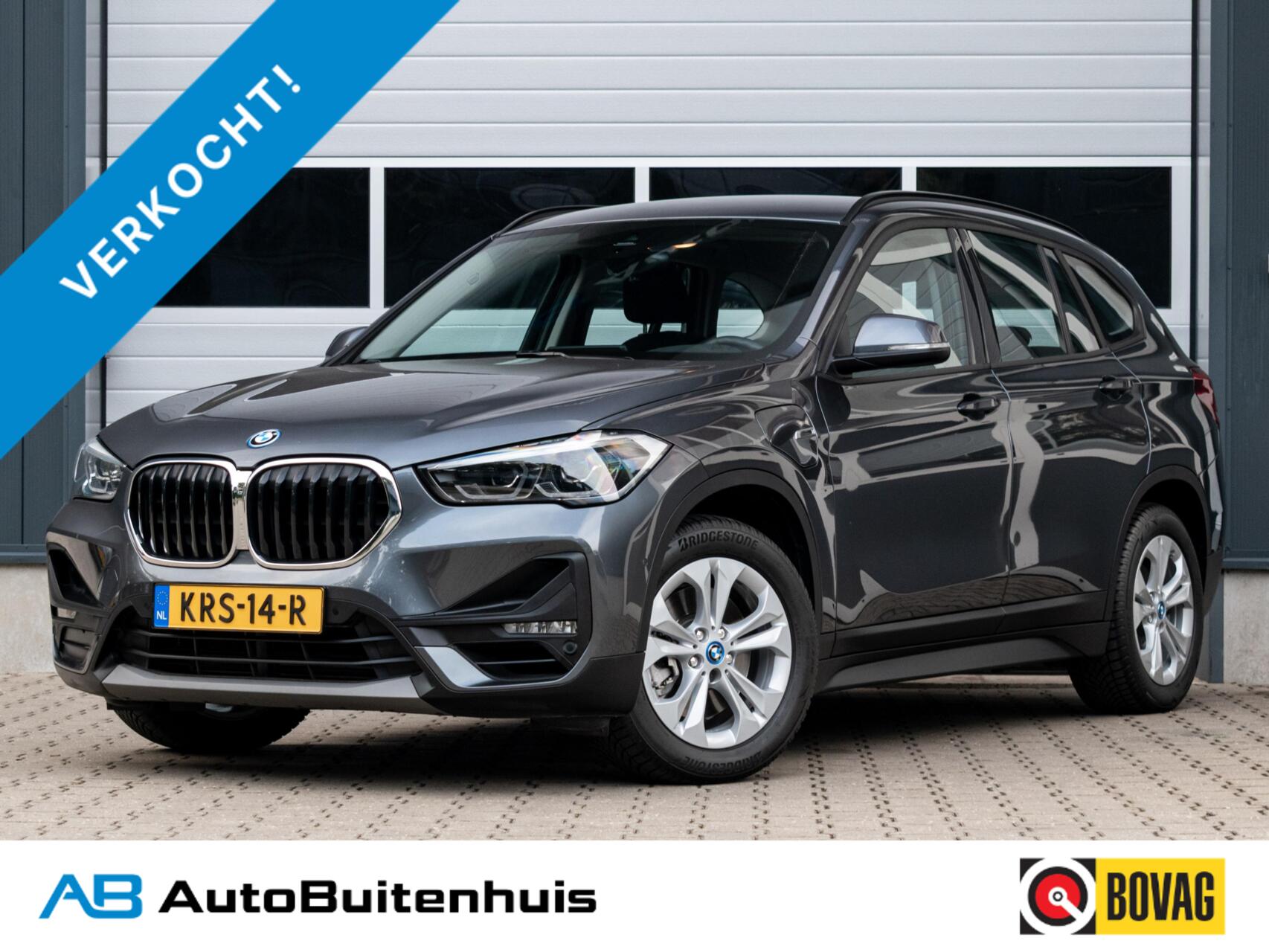 BMW X1 xDrive25e High Executive|1e EIGENAAR|ELEK.KLEP|TREKHAAK|HEAD-UP 2022 - voorkant