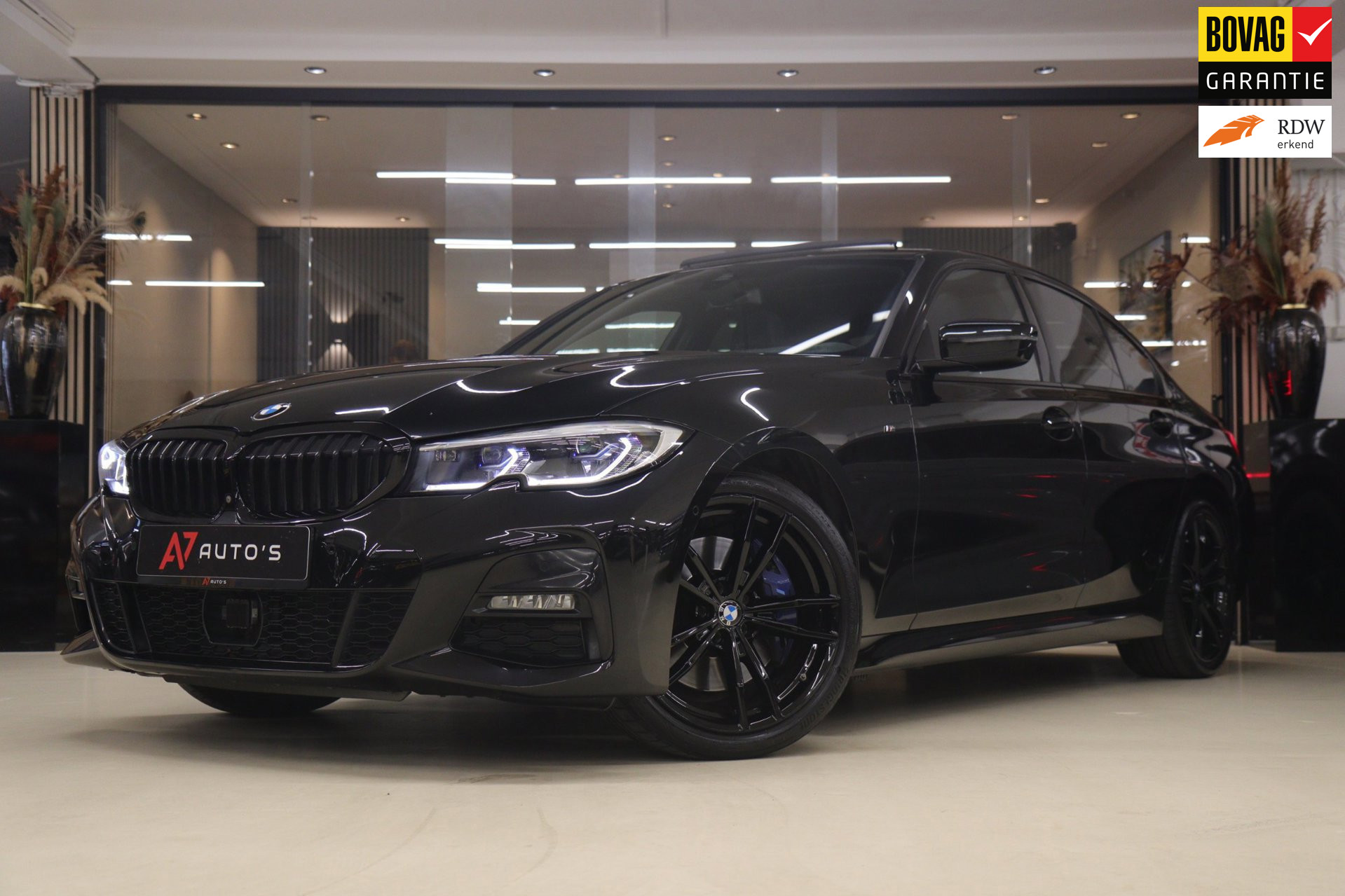 BMW 3-serie 330i High Executive PANO/CARPLAY/SFEER/HK/HUD/VOL 2020 - voorkant