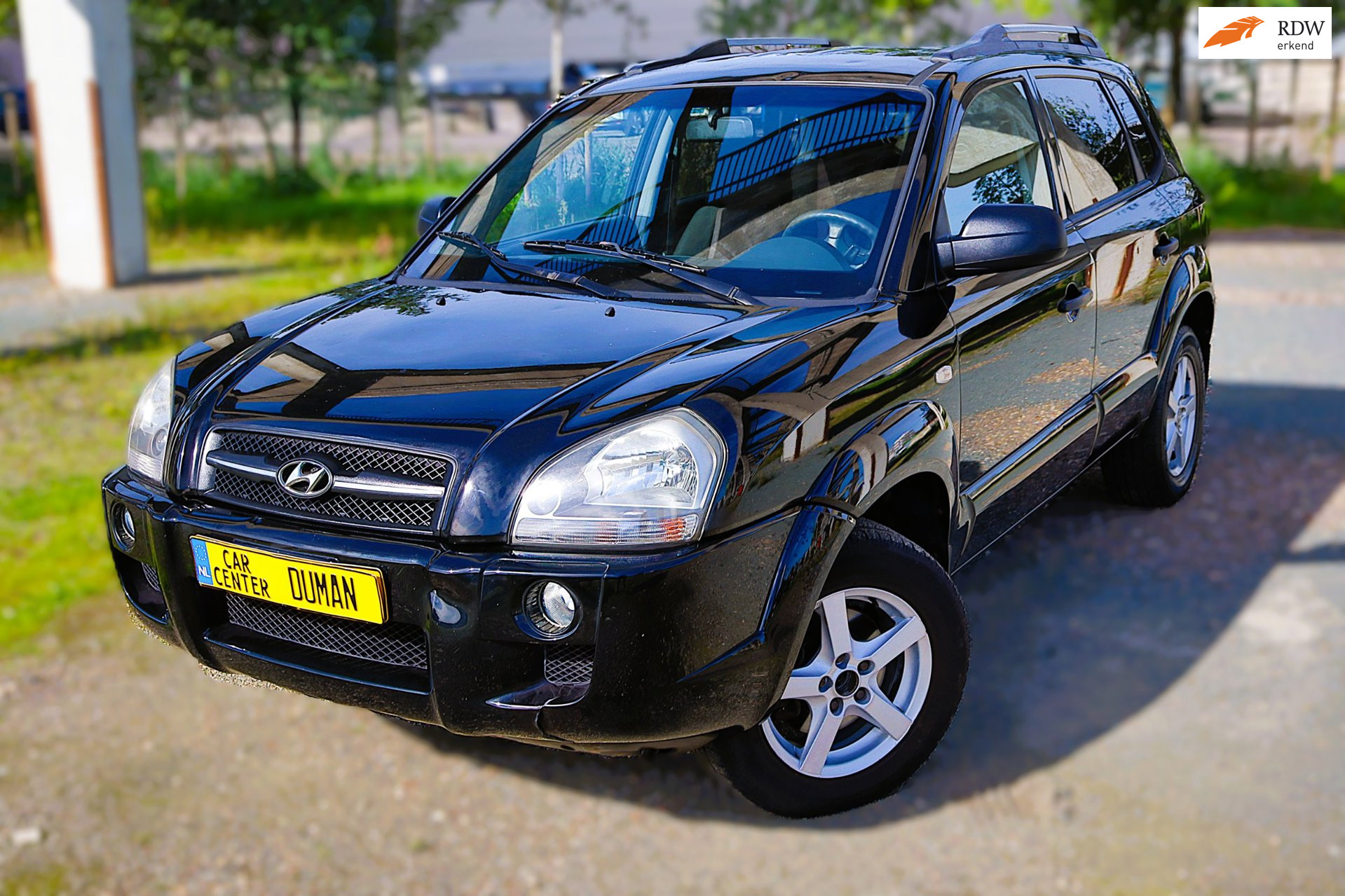 Hyundai Tucson 2.0i Dynamic Executive NAP TREKHAAK CRUISE 2009 - voorkant