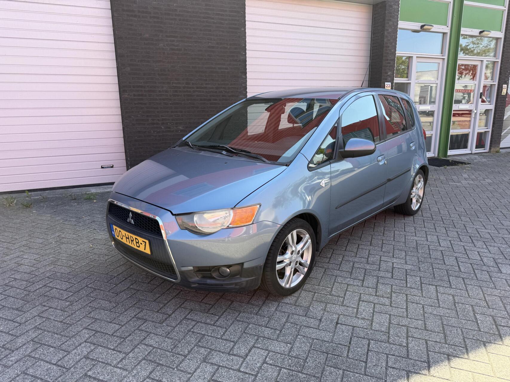 Mitsubishi Mitsubishi Colt 1.3 Instyle Trekhaak| Leder| Cruise| Airco| 5D 2009 - voorkant