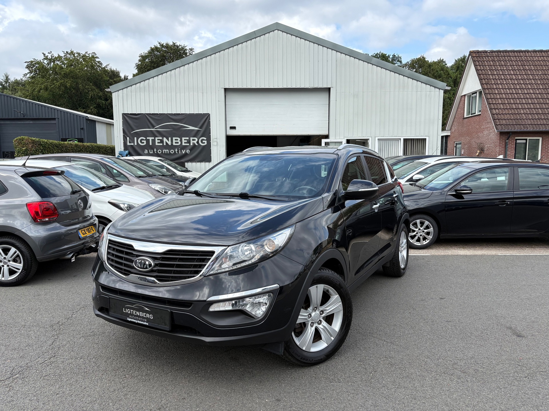 Kia Sportage 1.6 GDI X-ecutive Plus Pack CRUISE/CLIMA/NAP 2012 - voorkant