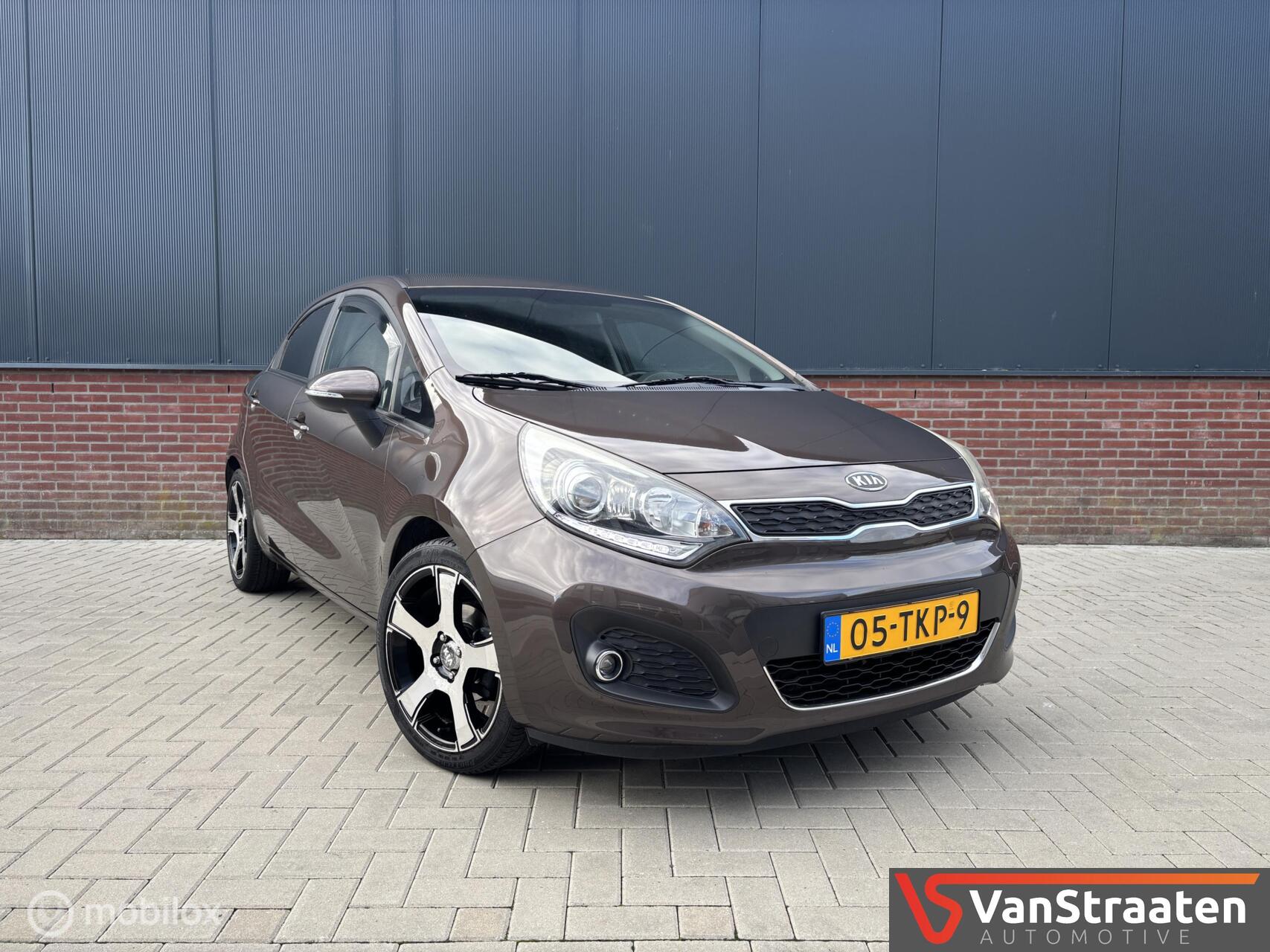 Kia Rio 1.2 CVVT Super Pack | Airco | Cruise | Keyless | PDC 2012 - voorkant