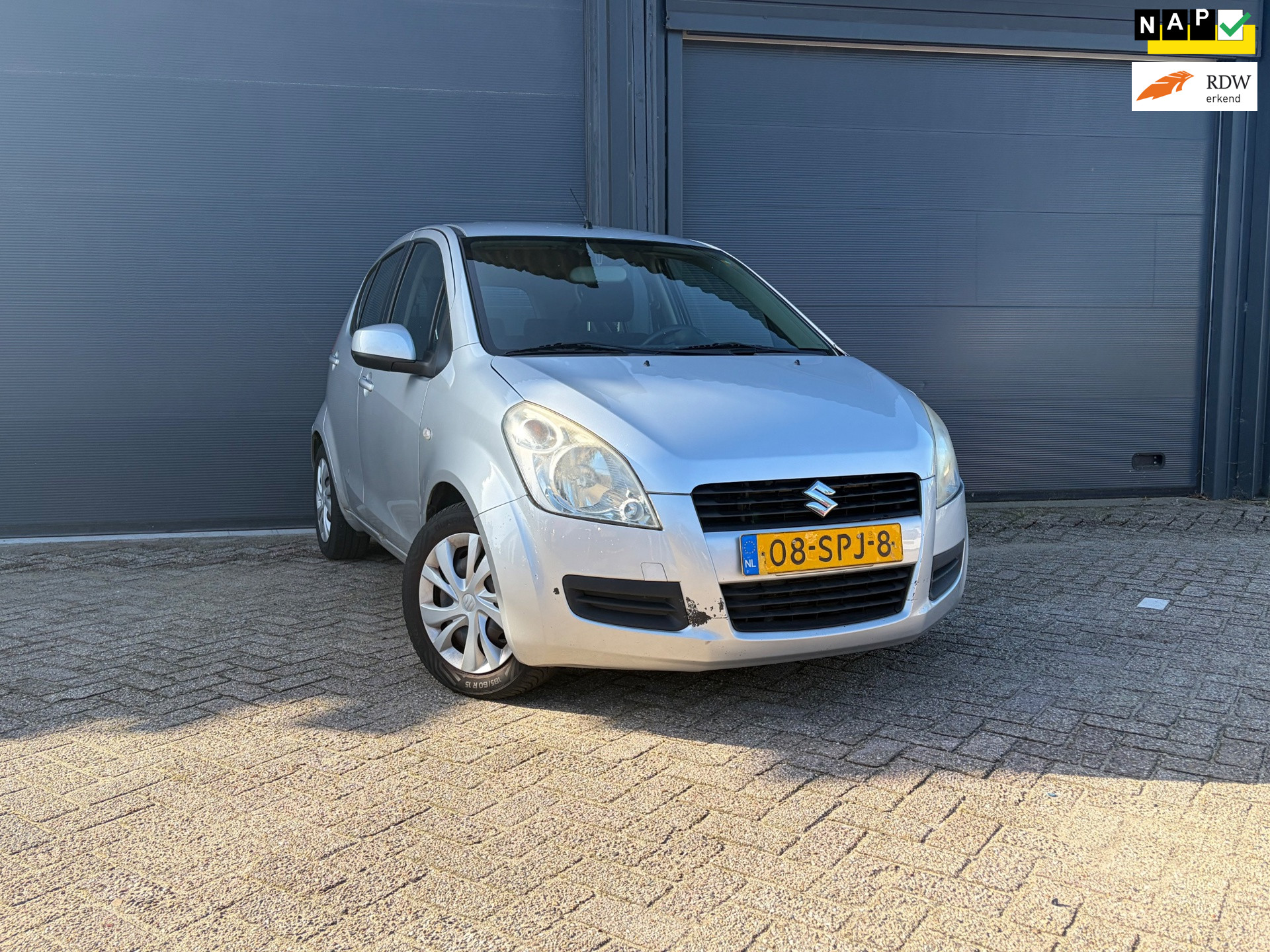 Suzuki Splash 1.0 | 5 Deurs | Airco | Trekhaak | NAP | 2011 - voorkant
