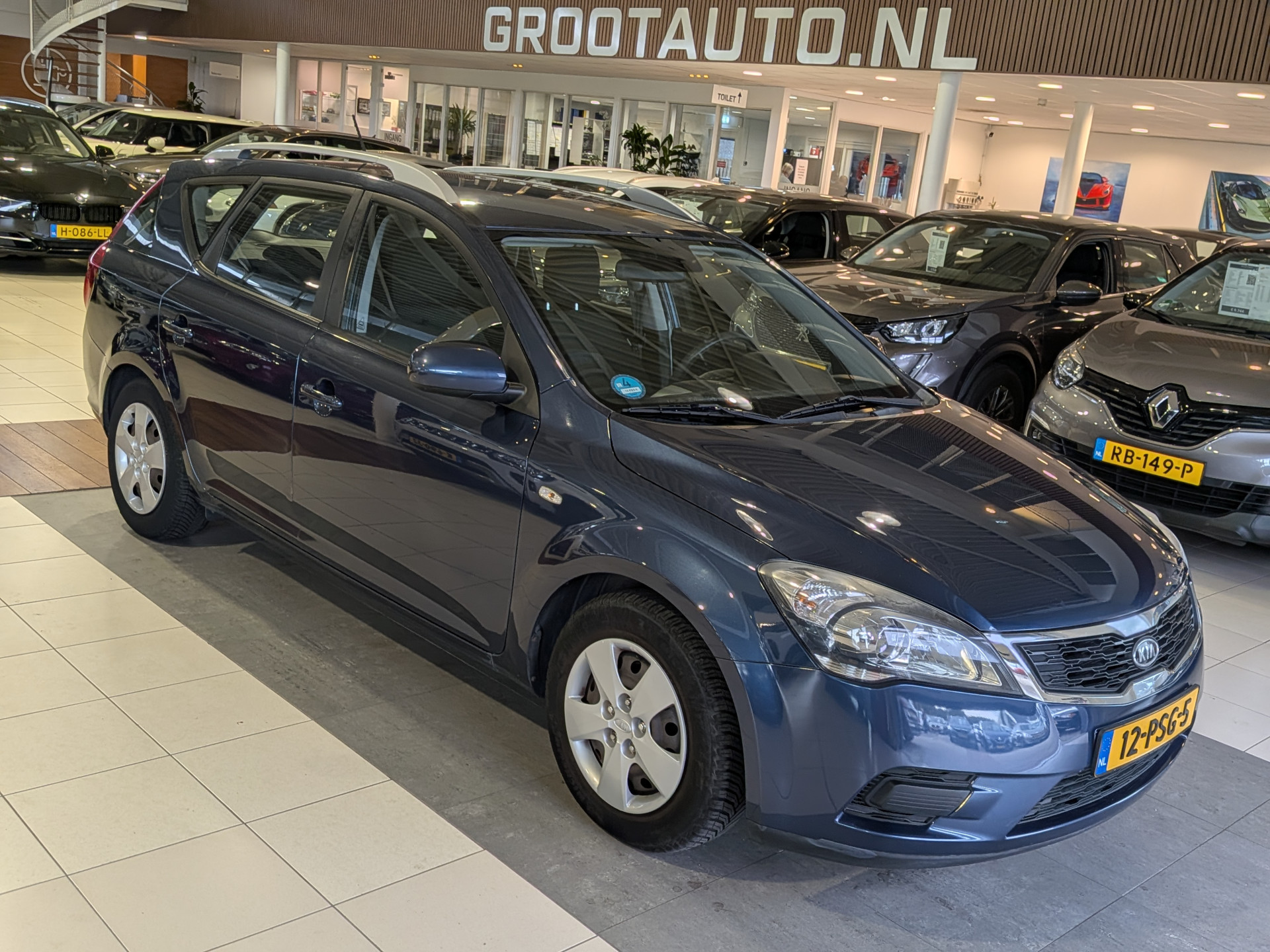 Kia Cee D 1.4 CVVT X-tra 2011 - voorkant