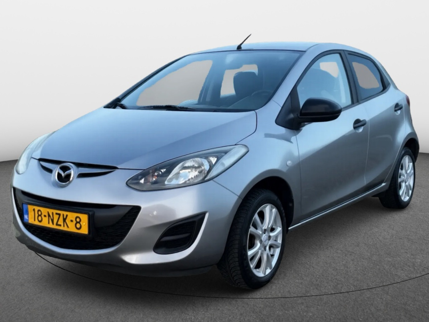 Mazda Mazda 2 1.3 Cool | Airco | Dealeronderhouden | 69.314km NAP! 2011 - voorkant