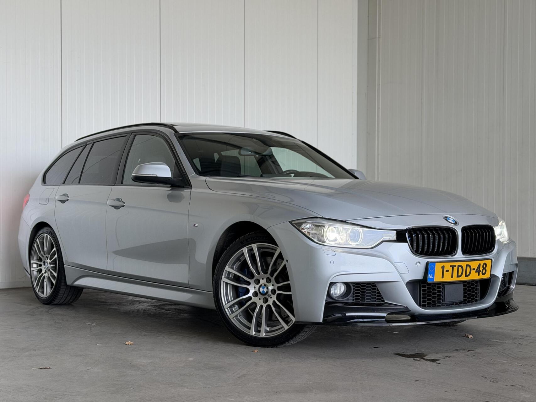 BMW 3-serie Touring 335i xDrive High Executive Upgrade 2014 - voorkant