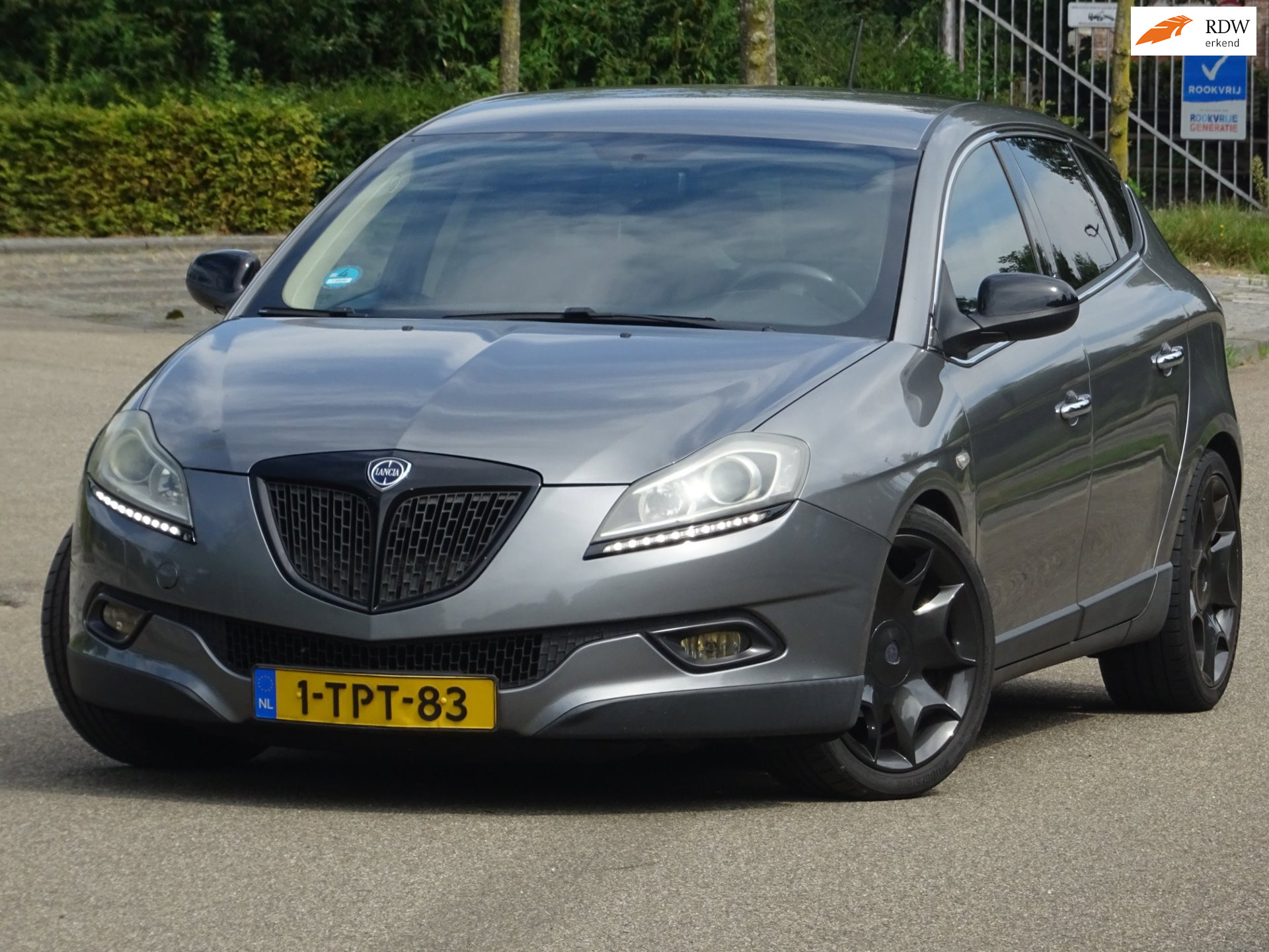 Lancia Lancia Delta 1.4-16V Oro BJ2011 LEER/CARPLAY/CLIMA/PDC/APK 2009 - voorkant