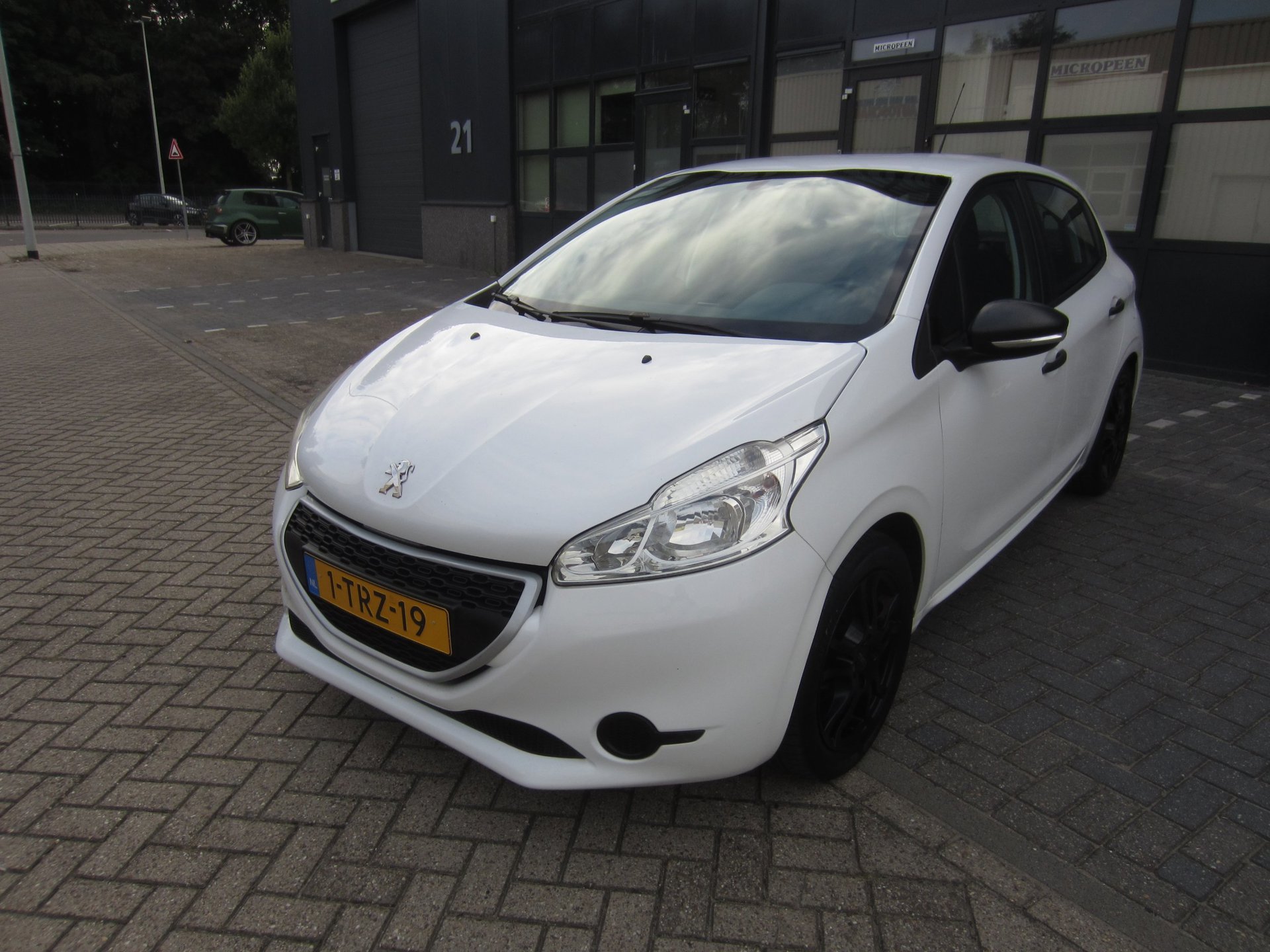 Peugeot 208 1.0 VTi Access 2014 Airco 82.000KM NAP! APK! 2014 - voorkant