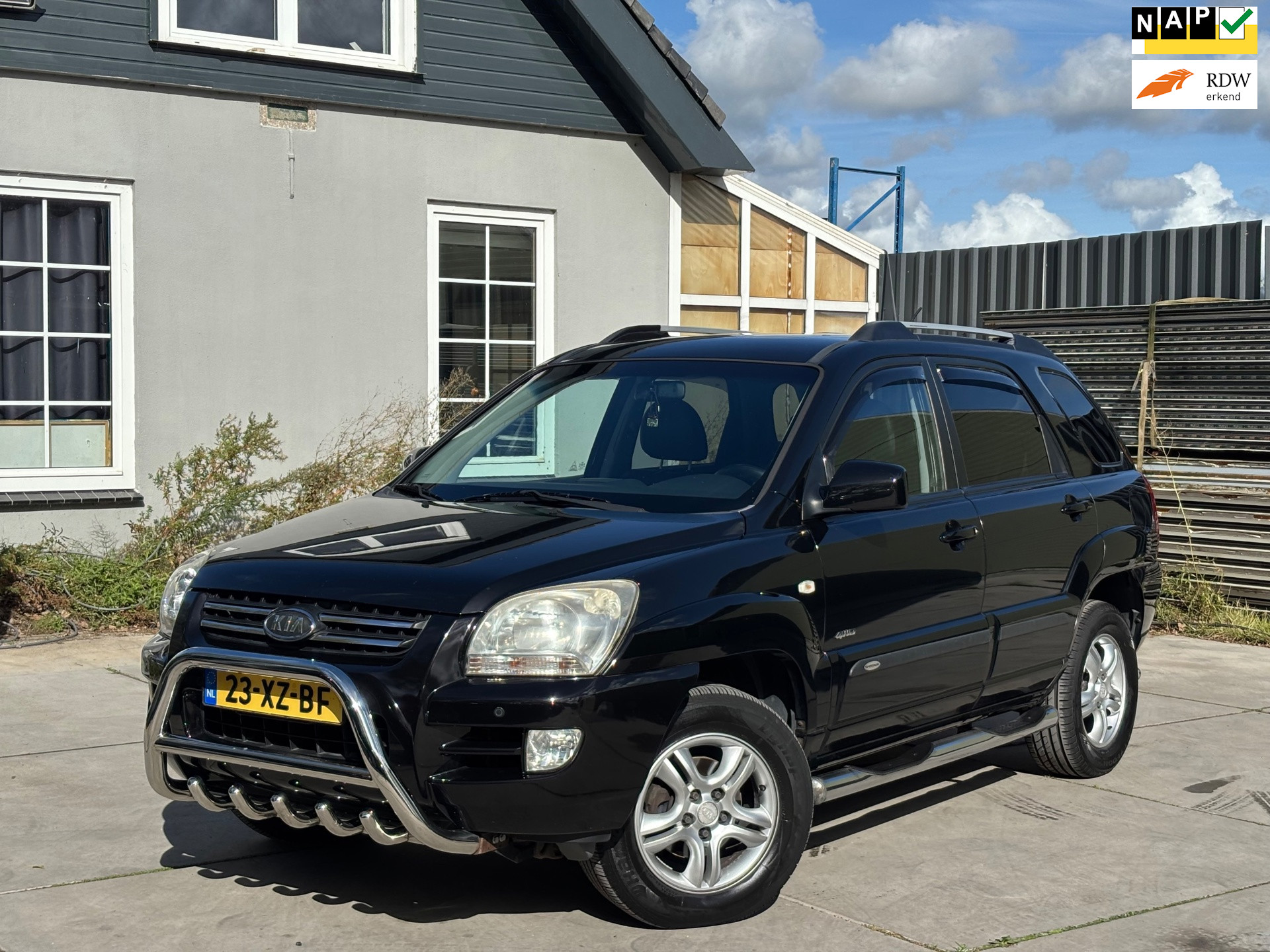 Kia Sportage 2.7 V6 X-pression 4WD | Leder | Airco | Parkeersensoren | Automaat | Full option | Nap | Rijklaar! 2008 - voorkant
