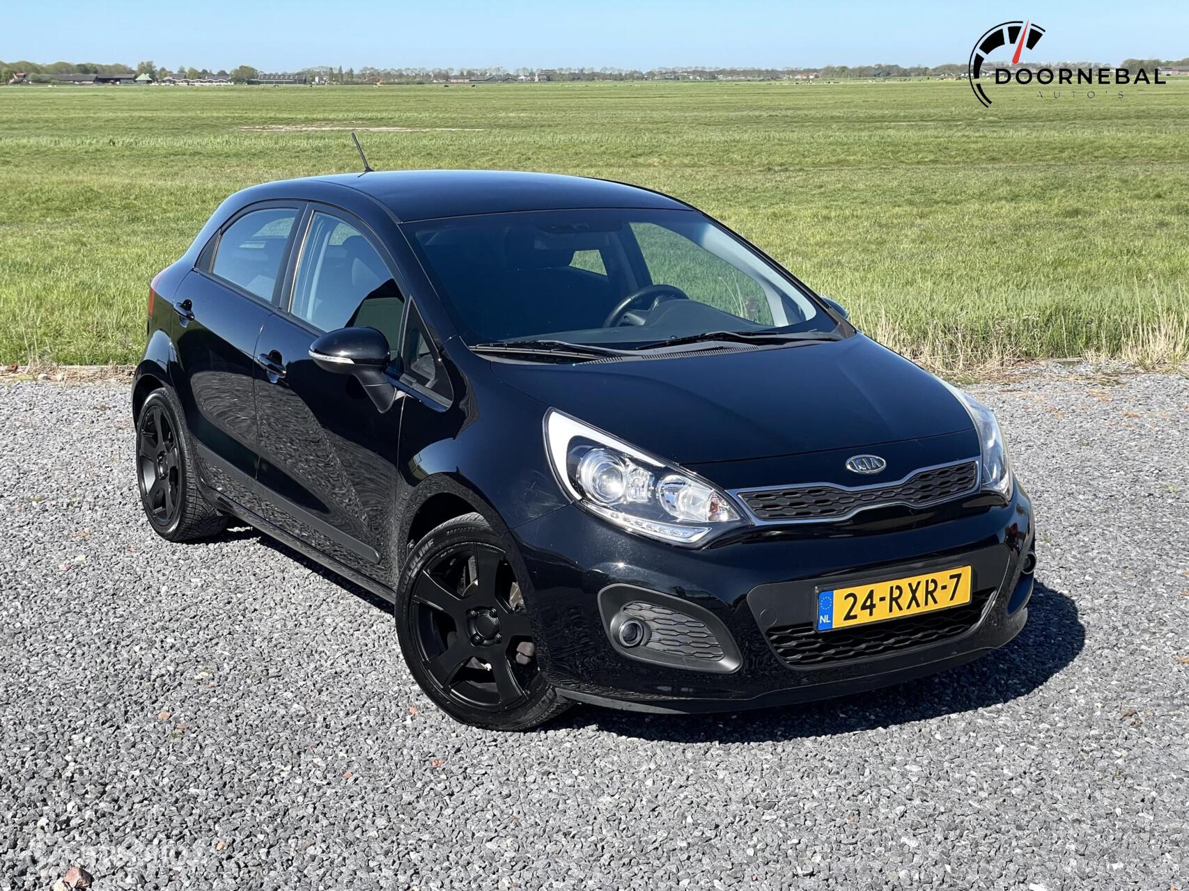 Kia Rio 1.2 CVVT Super Pack / CRUISE CONTROL / LED / HAAK! 2011 - voorkant